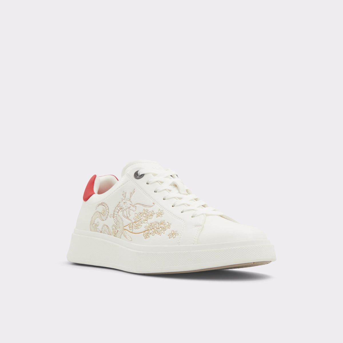Three-quarter angle of White Daxton Low top sneaker's front side