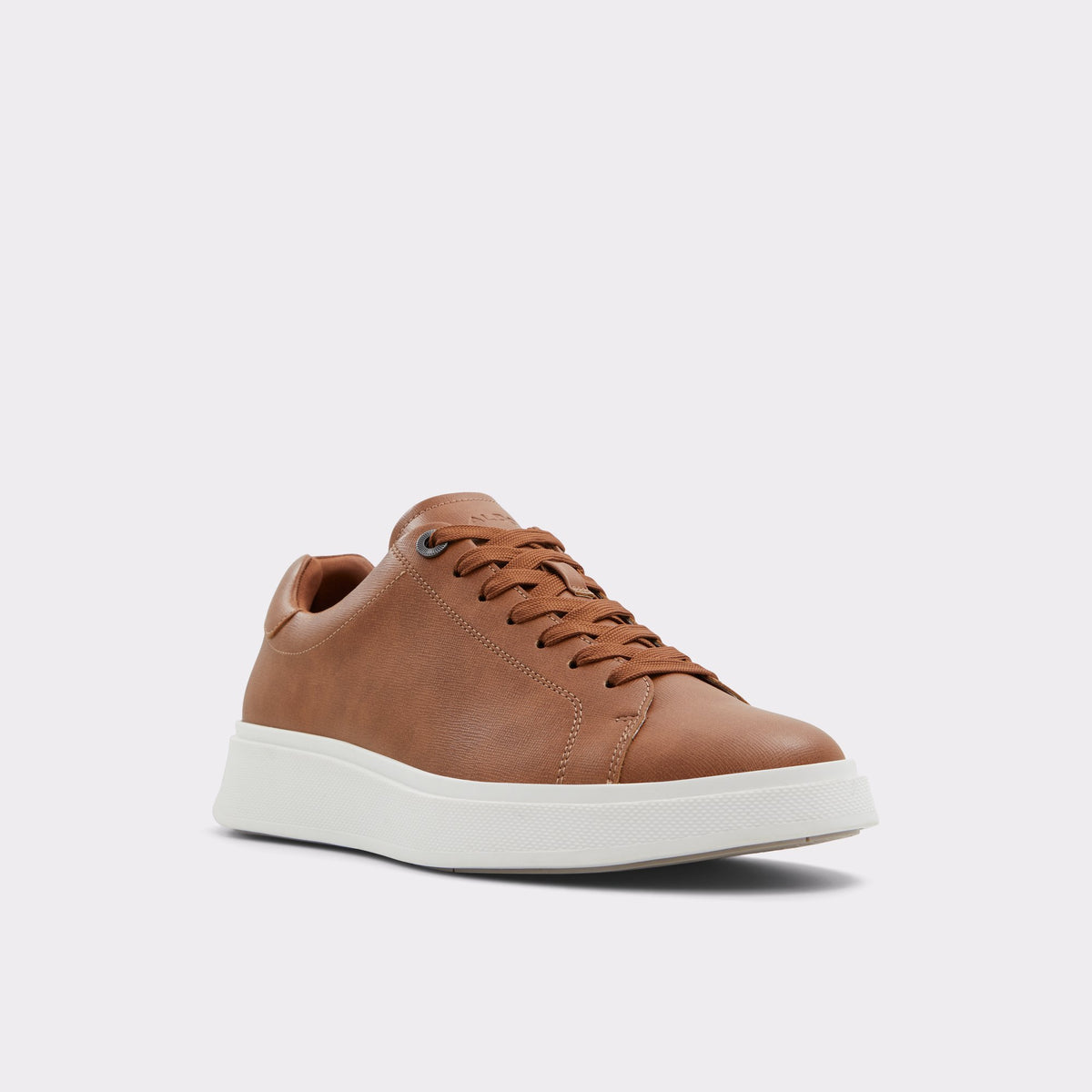 Three-quarter angle of Light Brown Magnus Low top sneaker's front side