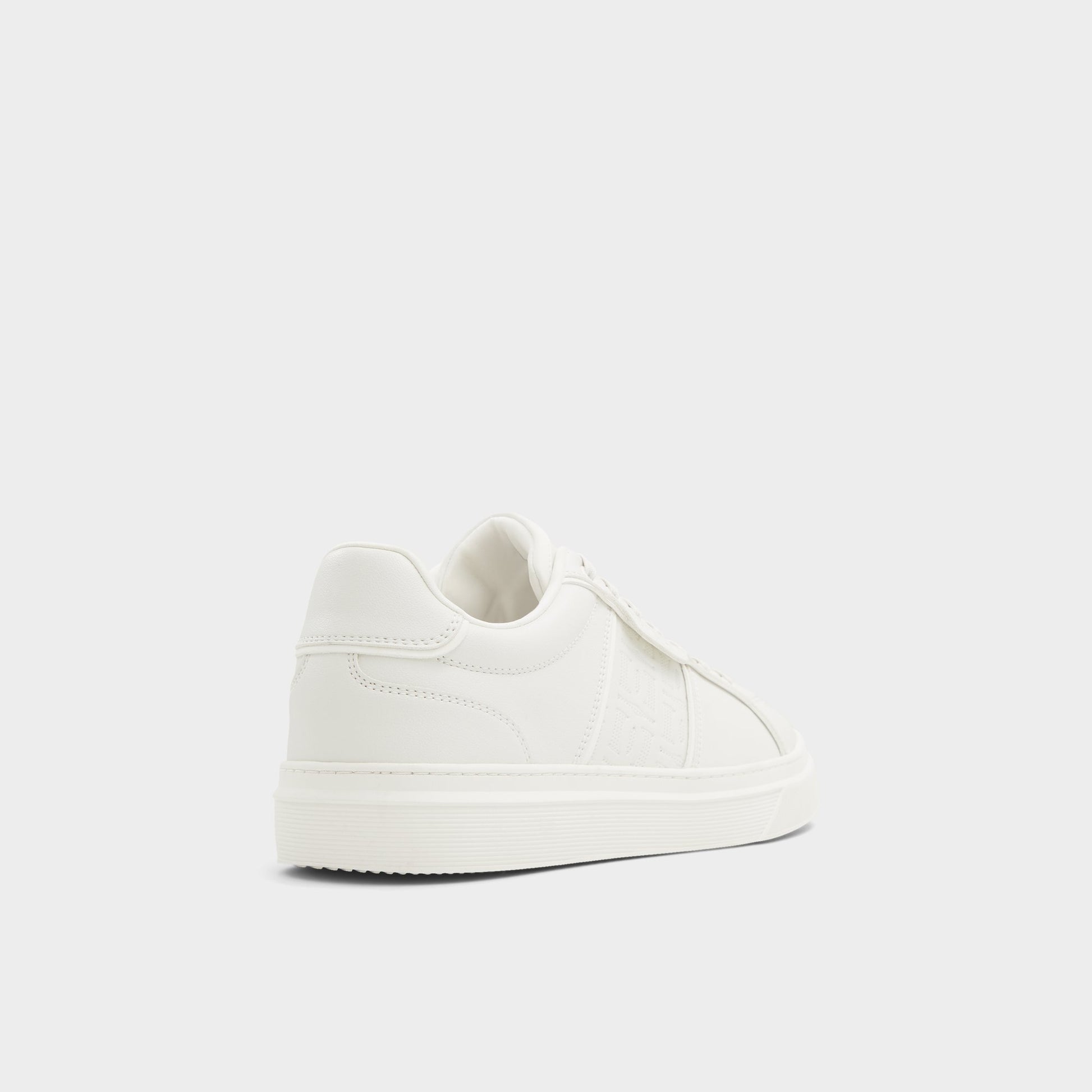 Three-quarter angle of White/Bone Courtline Low top sneaker's back side
