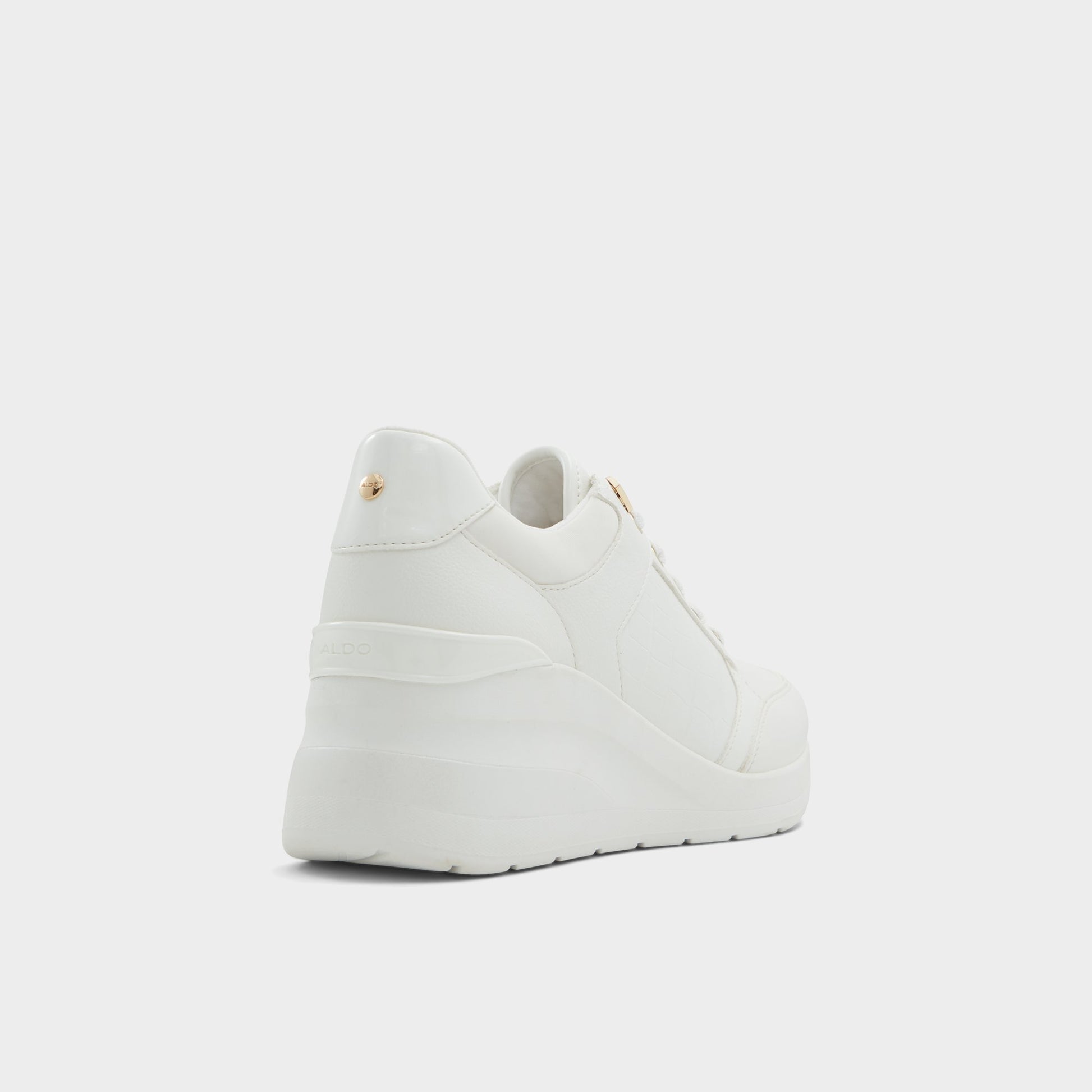 Three-quarter angle of White Overflow Iconistep Jogger sneaker's back side