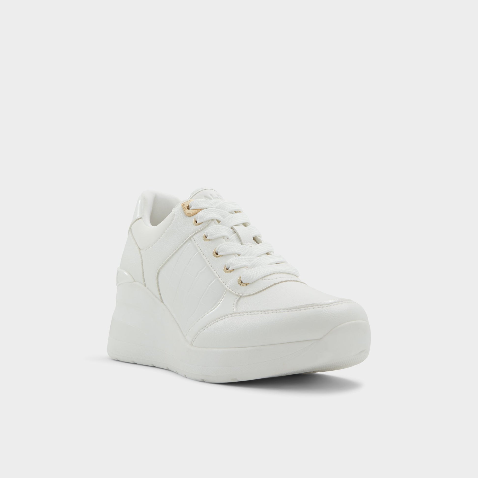 Three-quarter angle of White Overflow Iconistep Jogger sneaker's front side