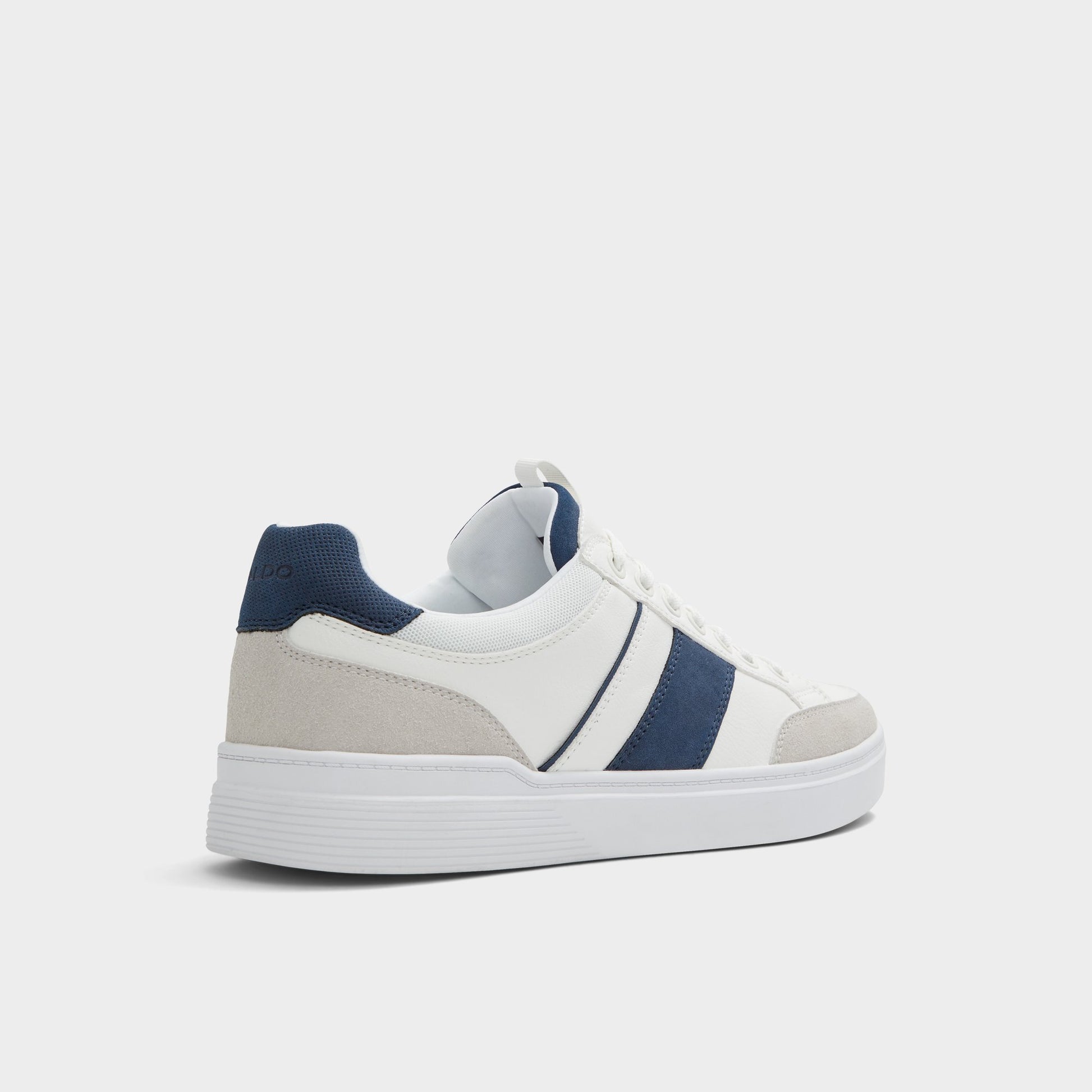Three-quarter angle of White Overflow Elio Low top sneaker's back side