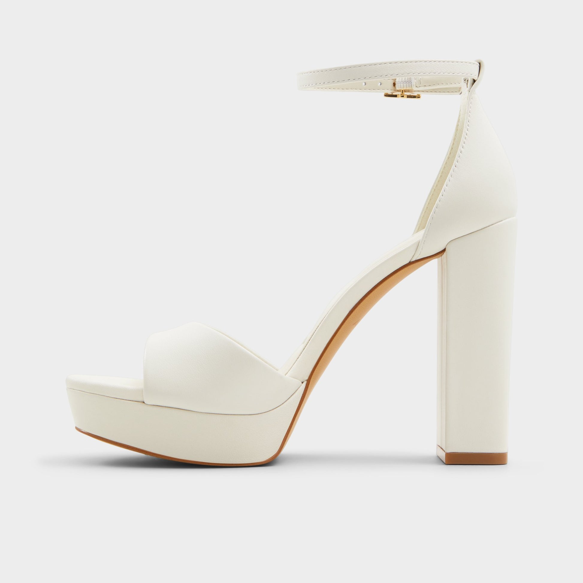 Side view of White/Bone Enaegyn2.0 Strappy heeled sandal