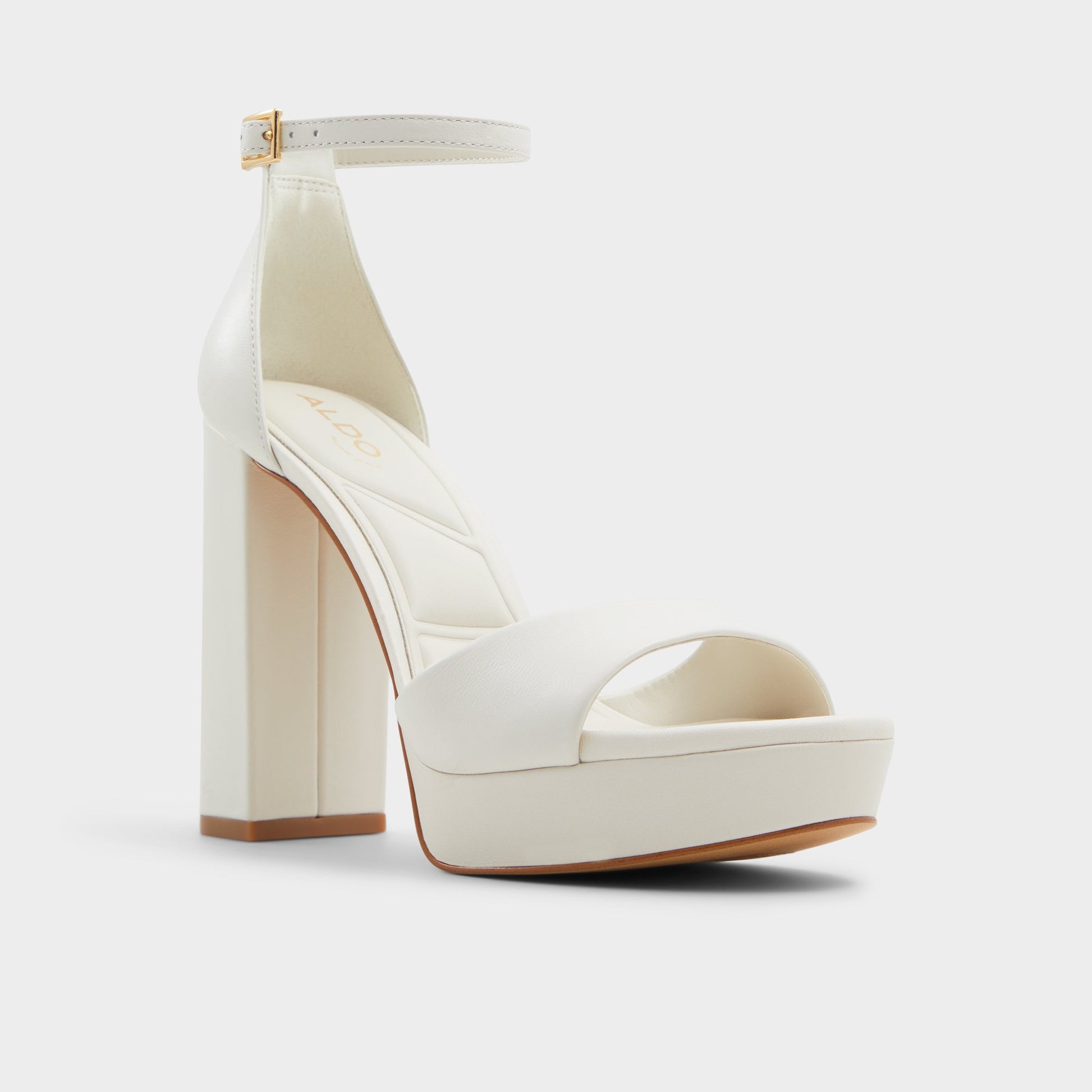 Three-quarter angle of White/Bone Enaegyn2.0 Strappy heeled sandal's front side