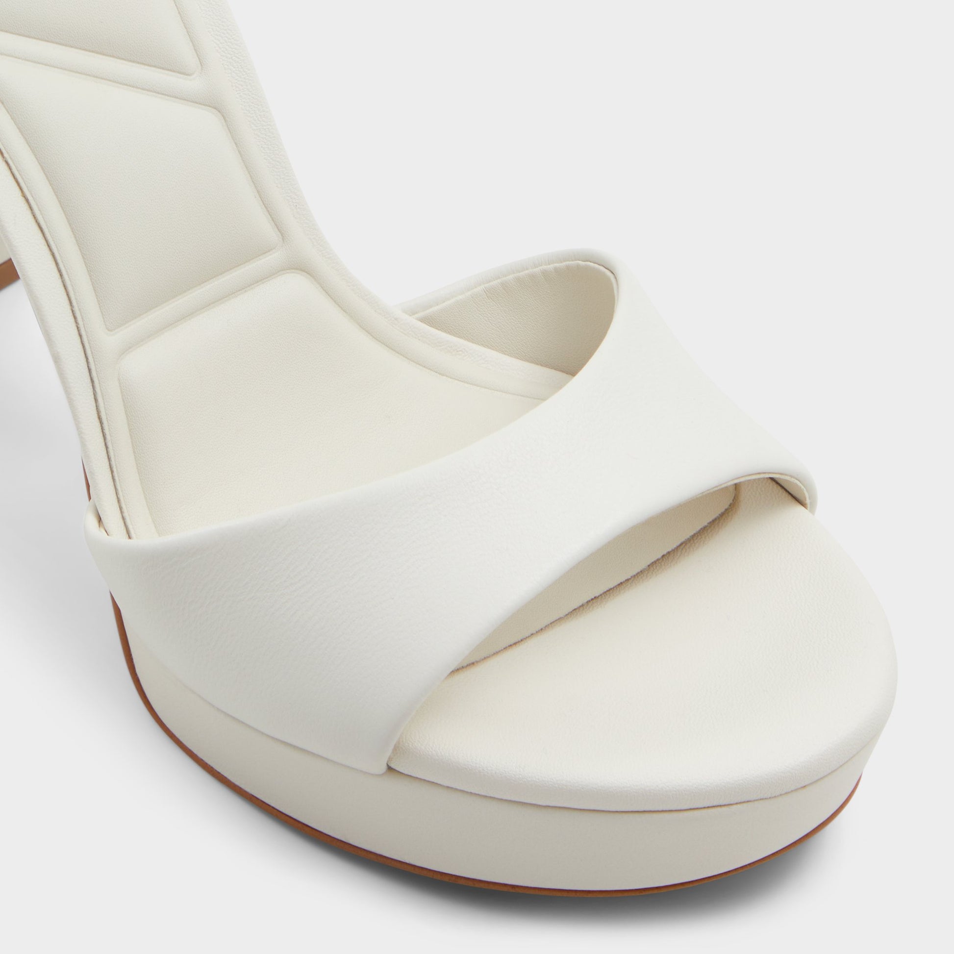 Close-up of the White/Bone Enaegyn2.0 Strappy heeled sandal