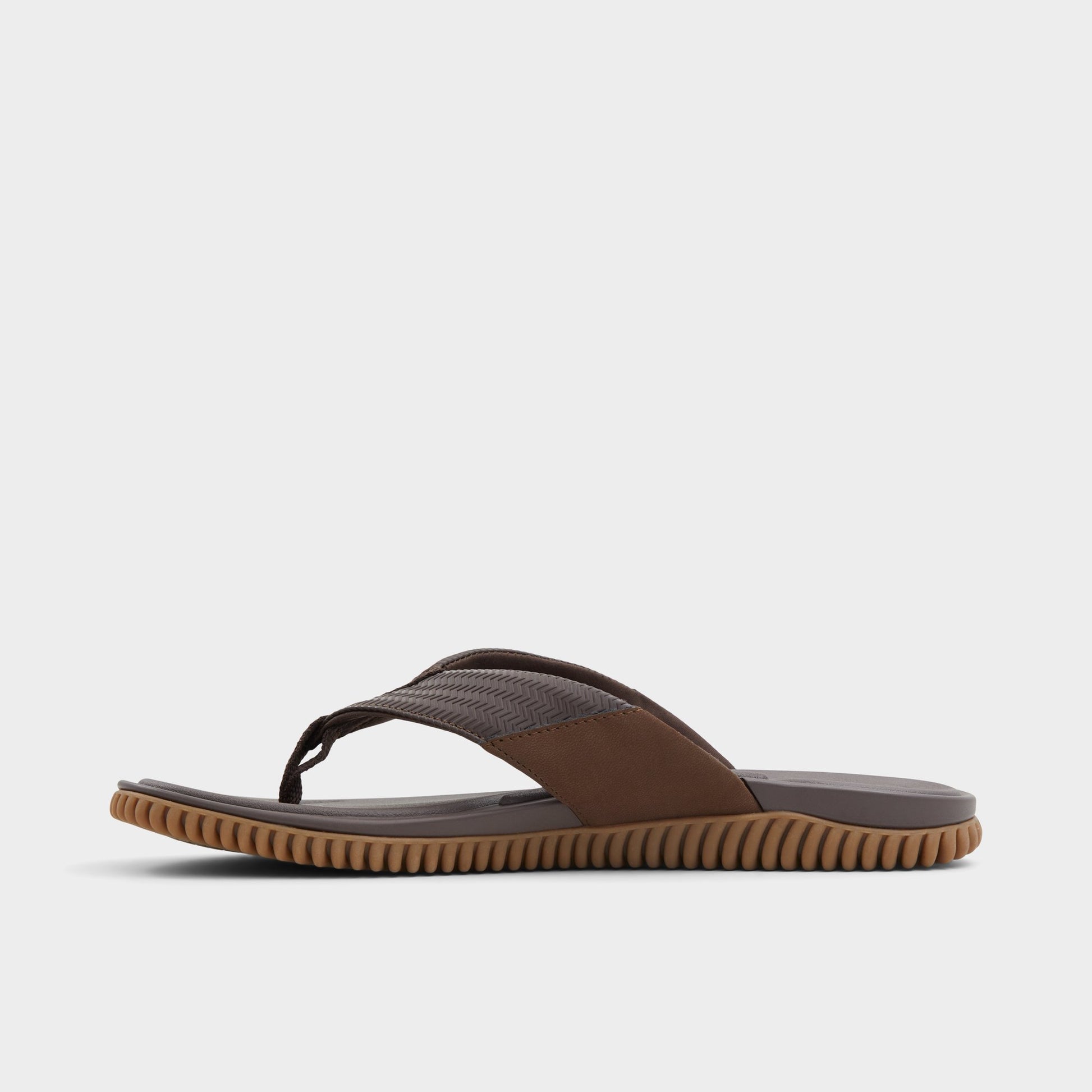 Side view of Other brown Riptide Flip flop