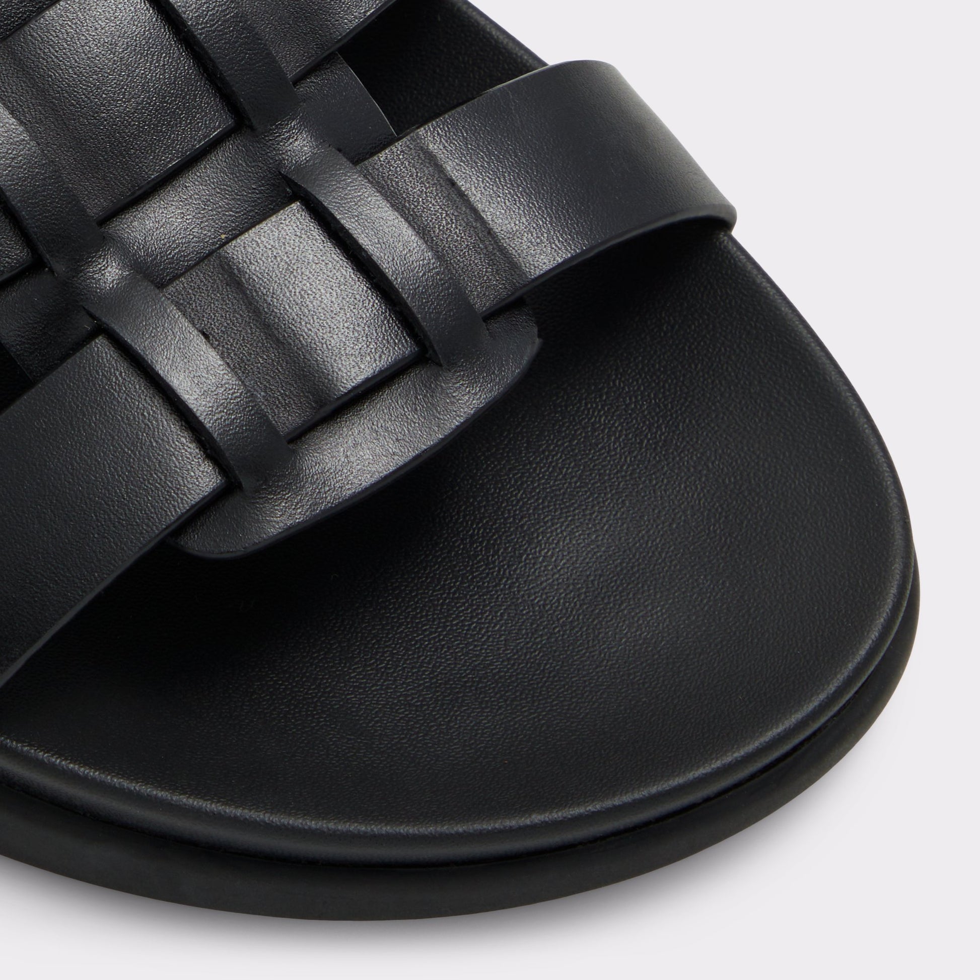 Close-up of the Other Black Canal Flat sandal