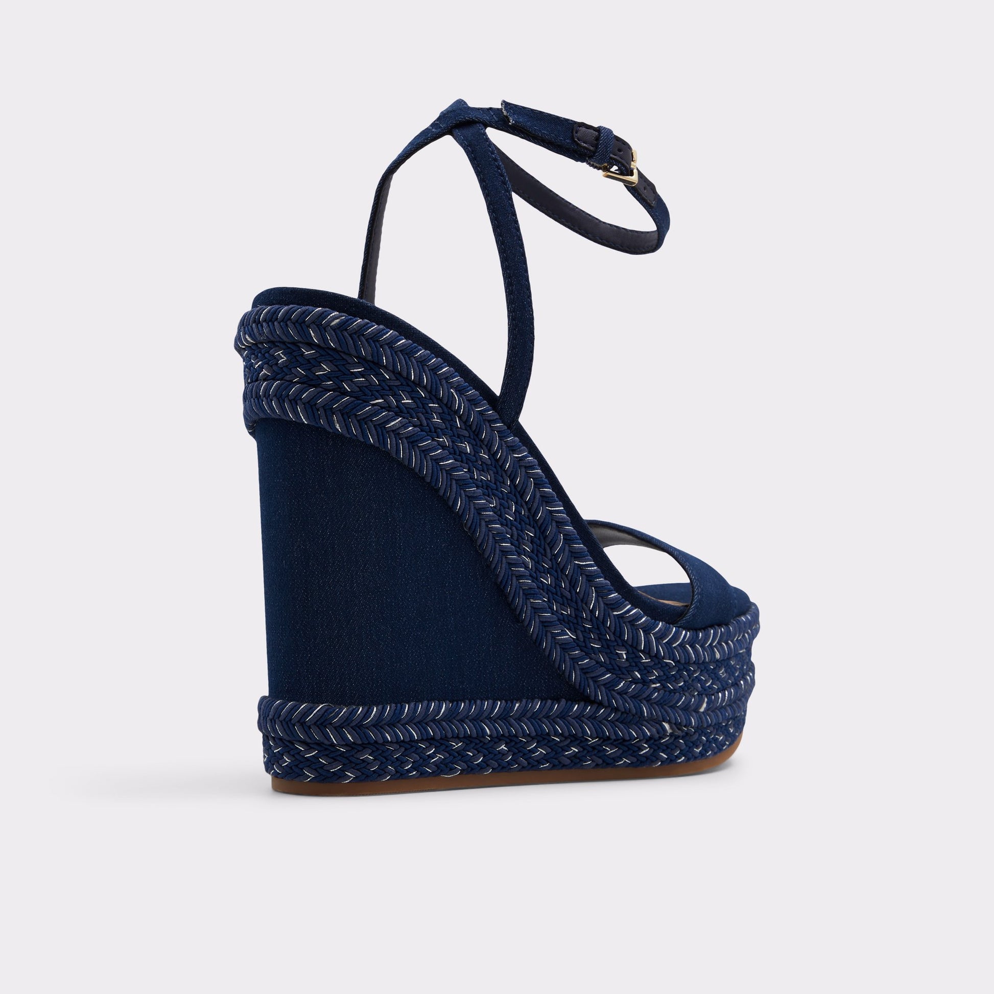 Three-quarter angle of Medium Blue Marysol Wedge sandal's back side