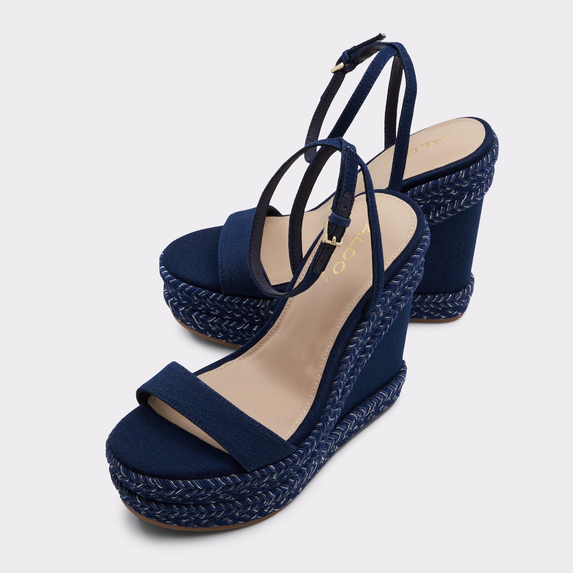 Highlighted view of a pair of Medium Blue Marysol Wedge sandals