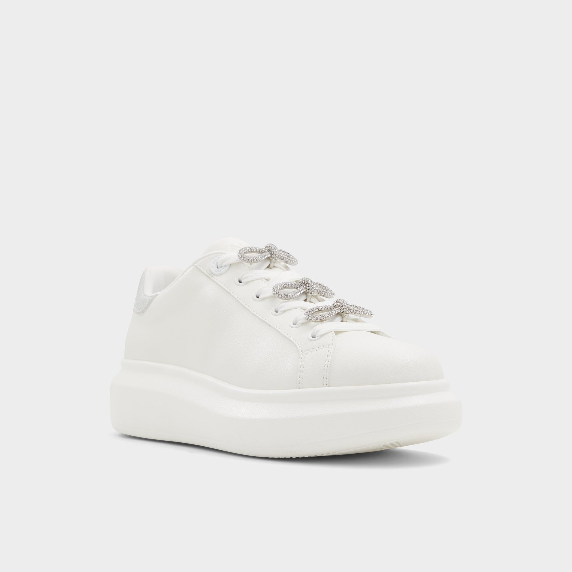 Three-quarter angle of White Merrick Low top sneaker's front side