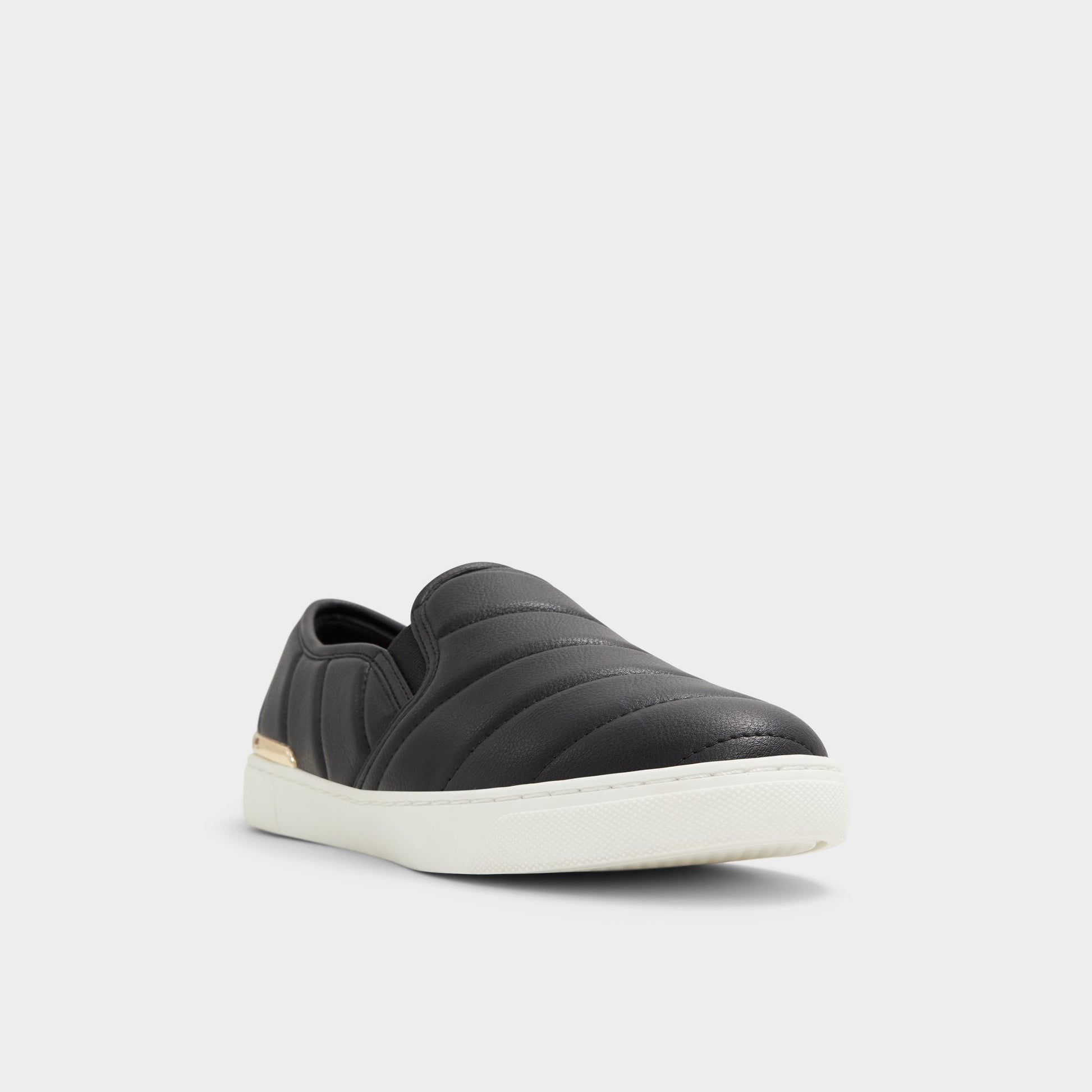 Three-quarter angle of Black Julianne Slip-on sneaker's front side