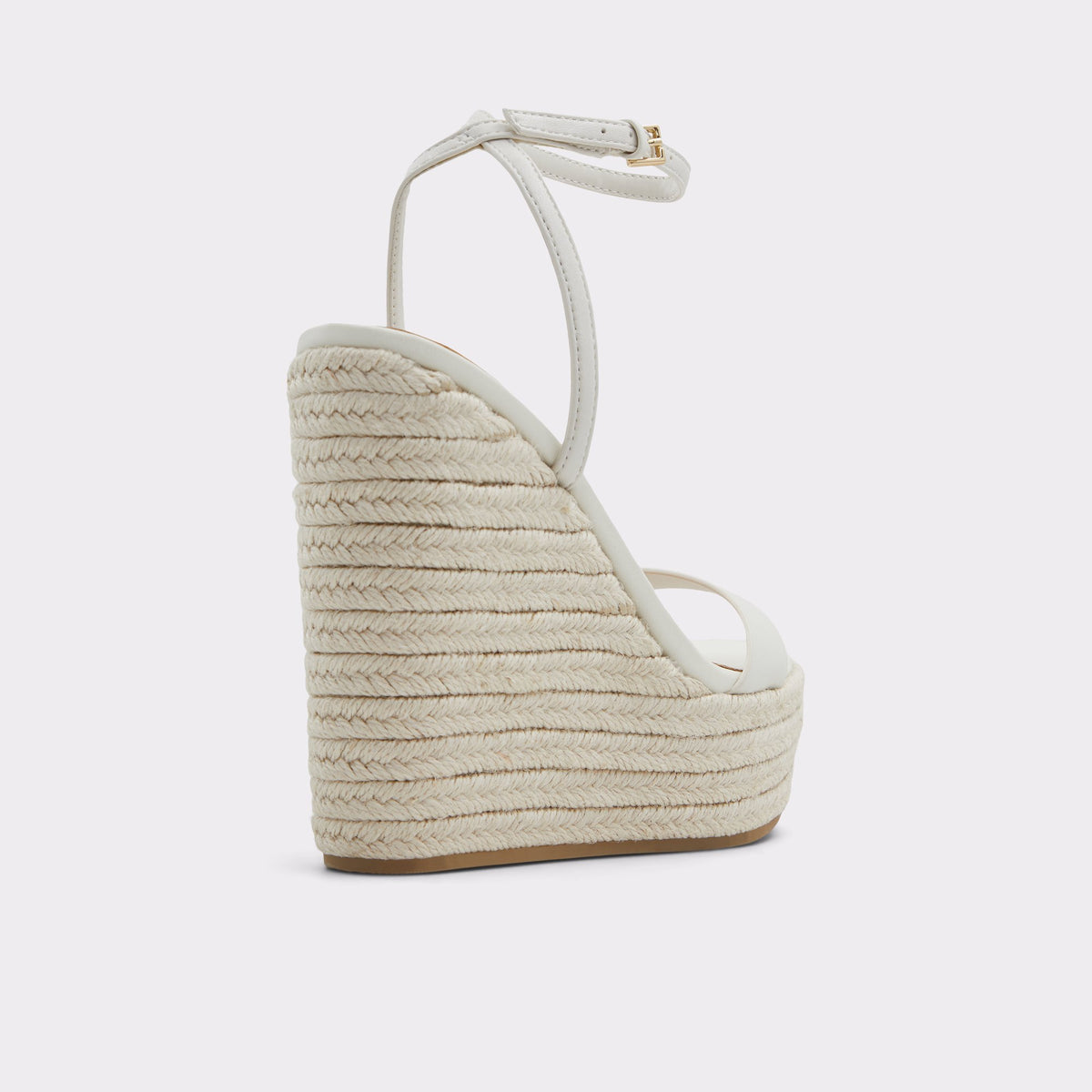 Three-quarter angle of White/Bone Marysol Wedge sandal's back side