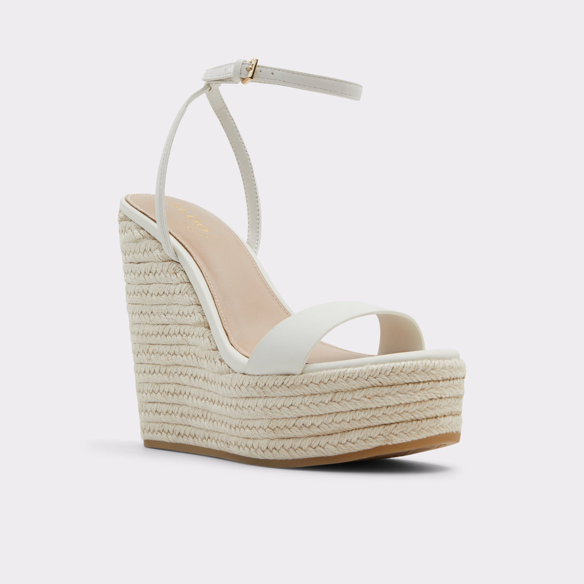 Three-quarter angle of White/Bone Marysol Wedge sandal's front side