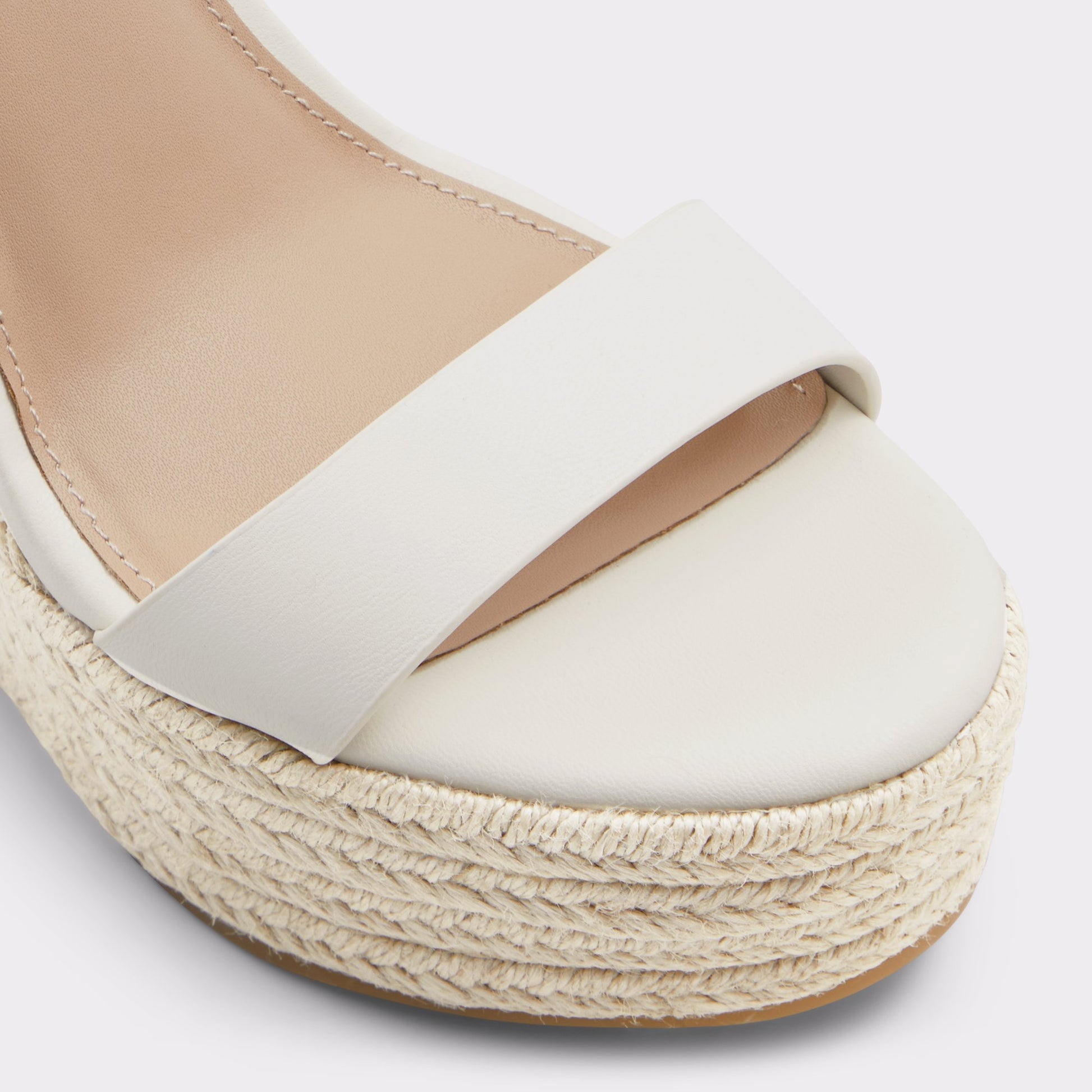Close-up of the White/Bone Marysol Wedge sandal