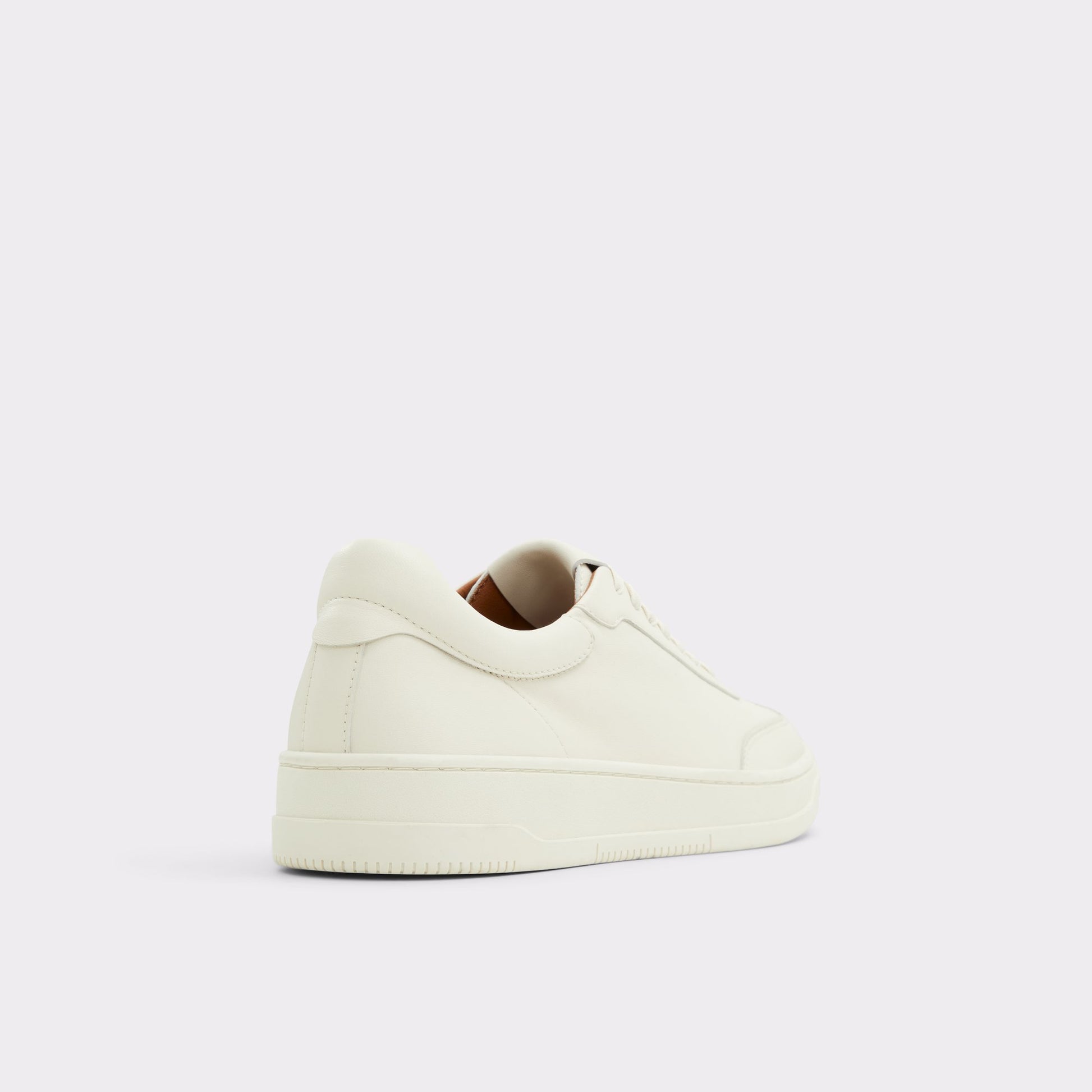 Three-quarter angle of Natural Baseliner Low top sneaker's back side