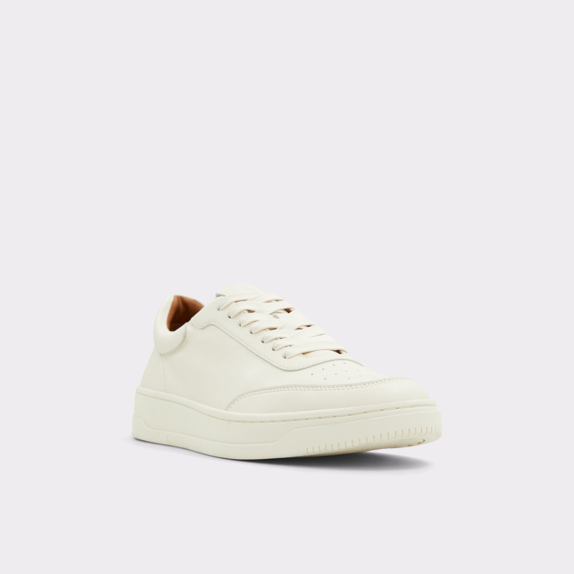Three-quarter angle of Natural Baseliner Low top sneaker's front side