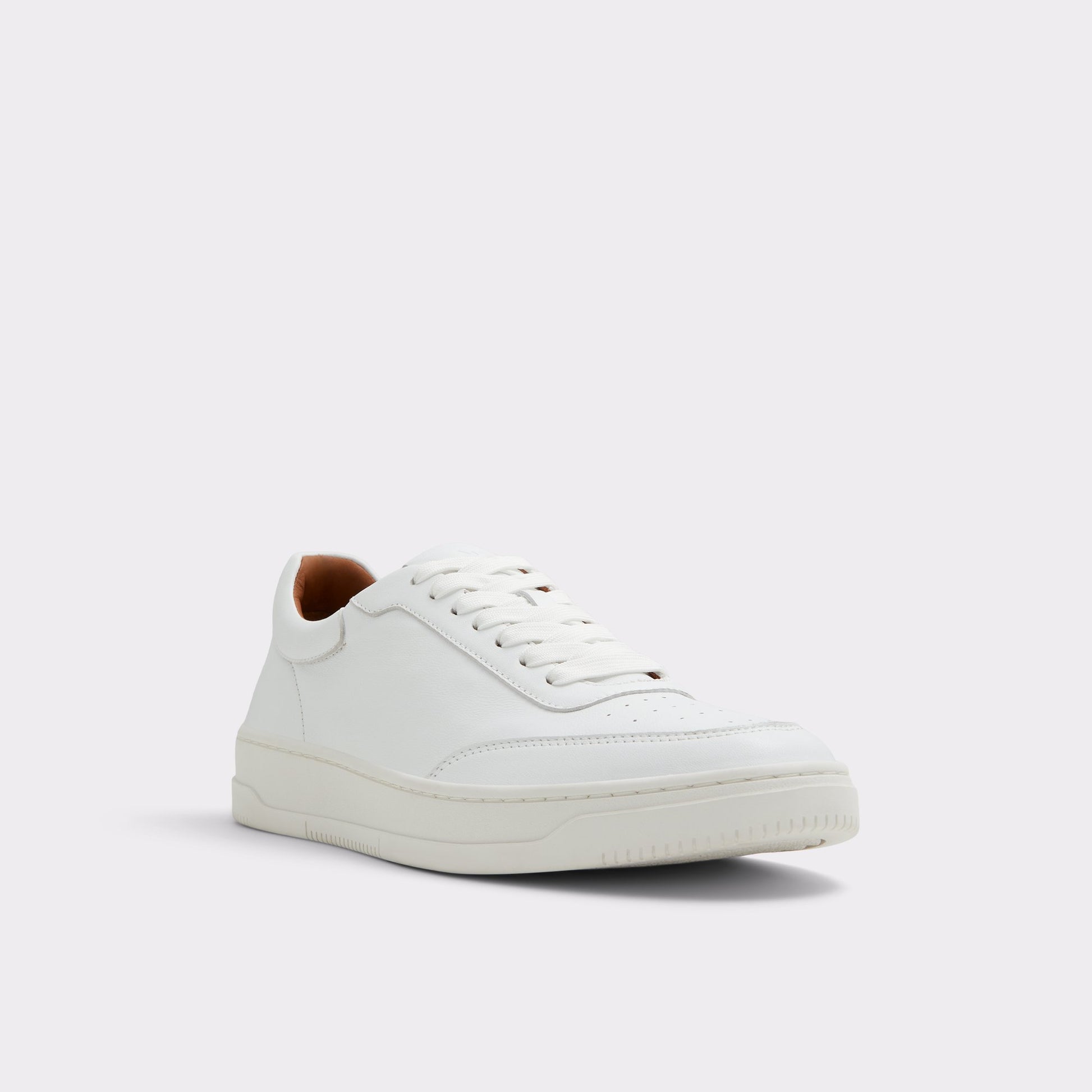 Three-quarter angle of White Baseliner Low top sneaker's front side
