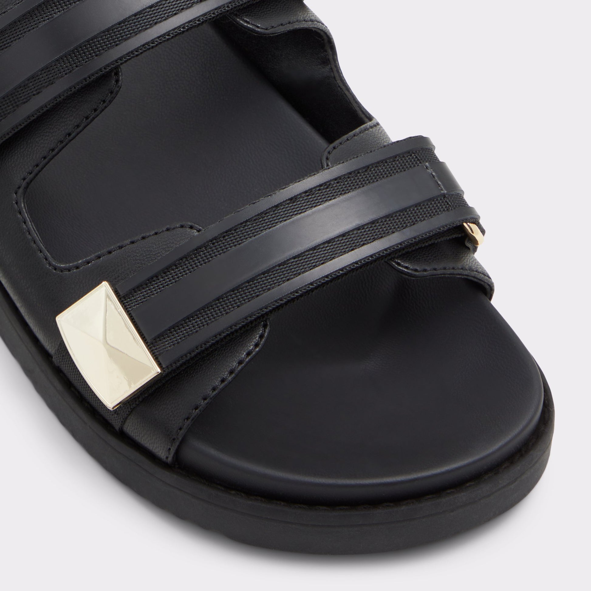 Close-up of the Black Coralina Strappy flat sandal