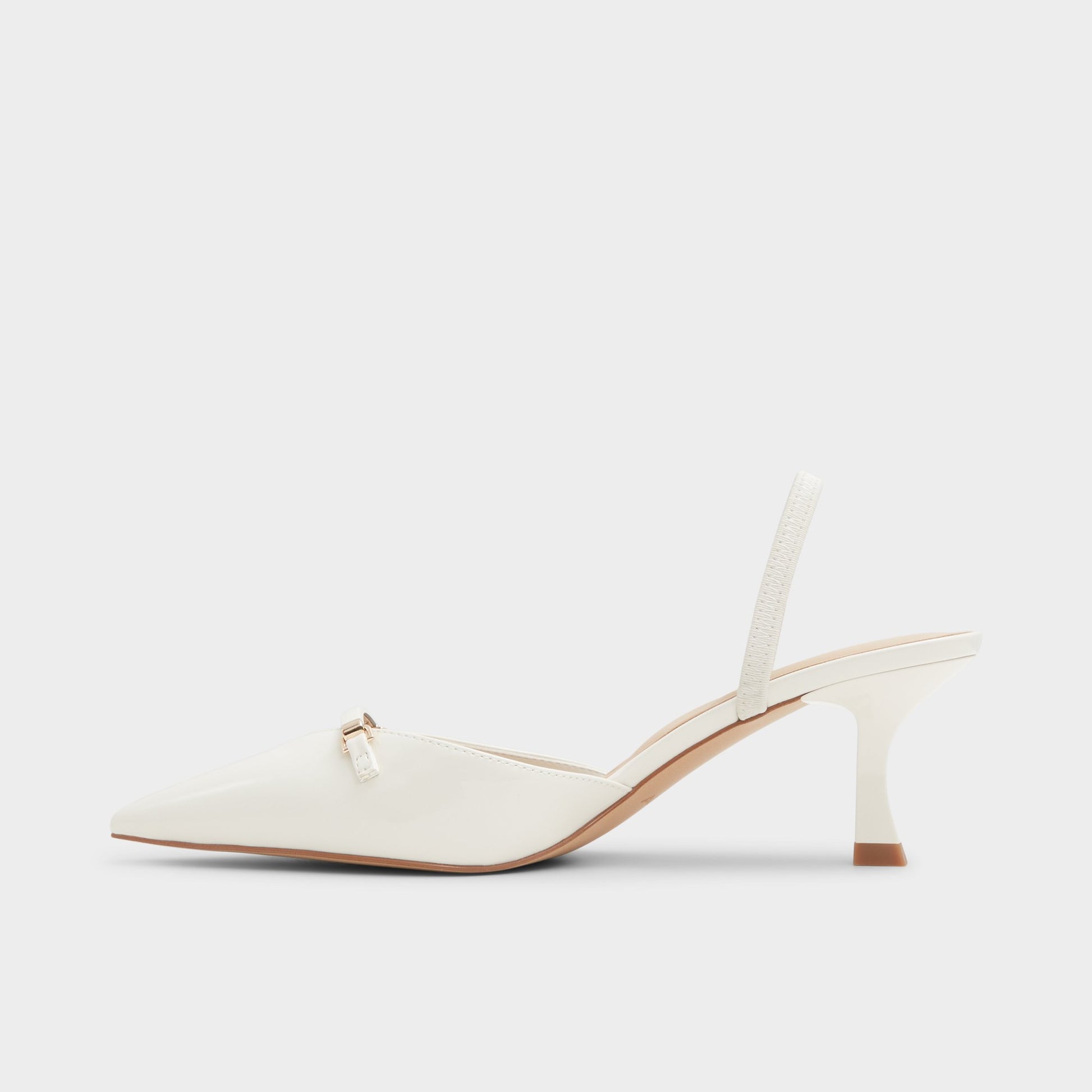 Side view of White/Bone Nailah Slingback heel