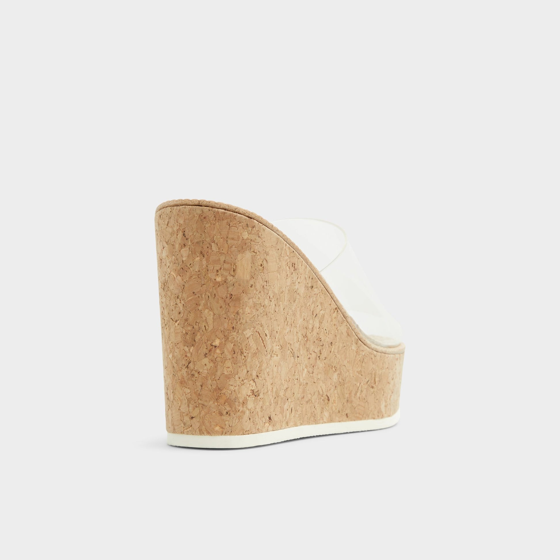 Three-quarter angle of Clear Midsommar Wedge sandal's back side