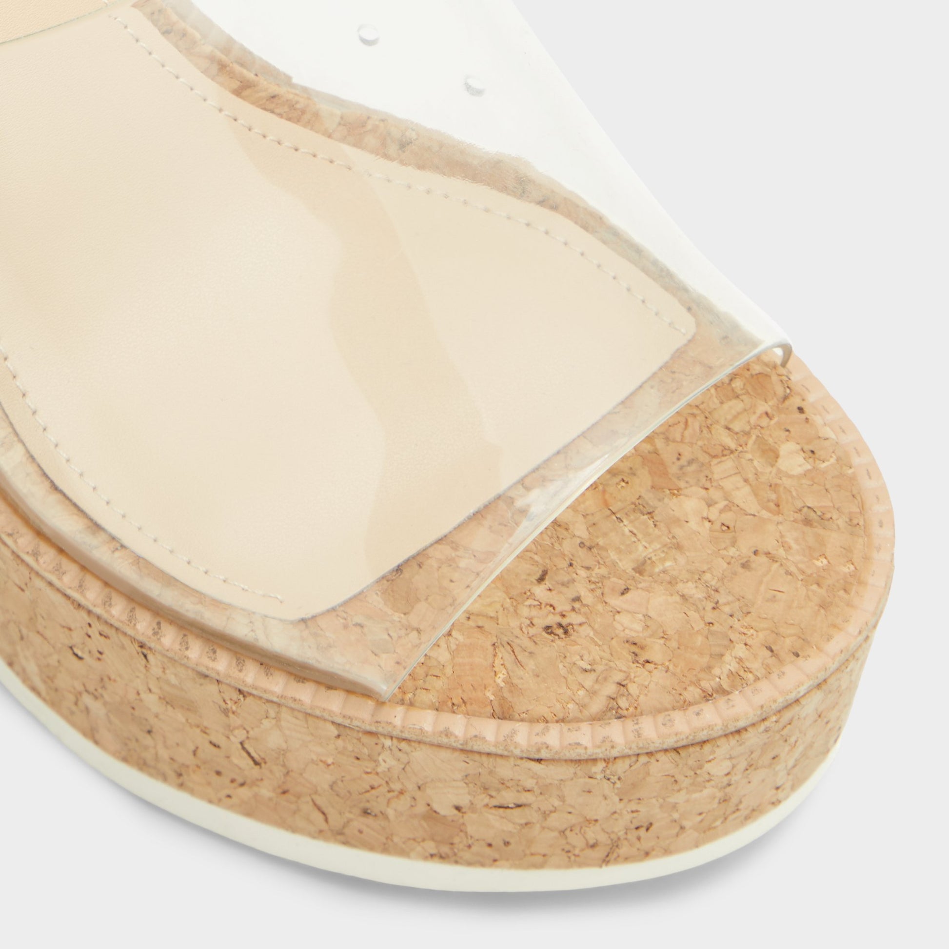 Close-up of the Clear Midsommar Wedge sandal