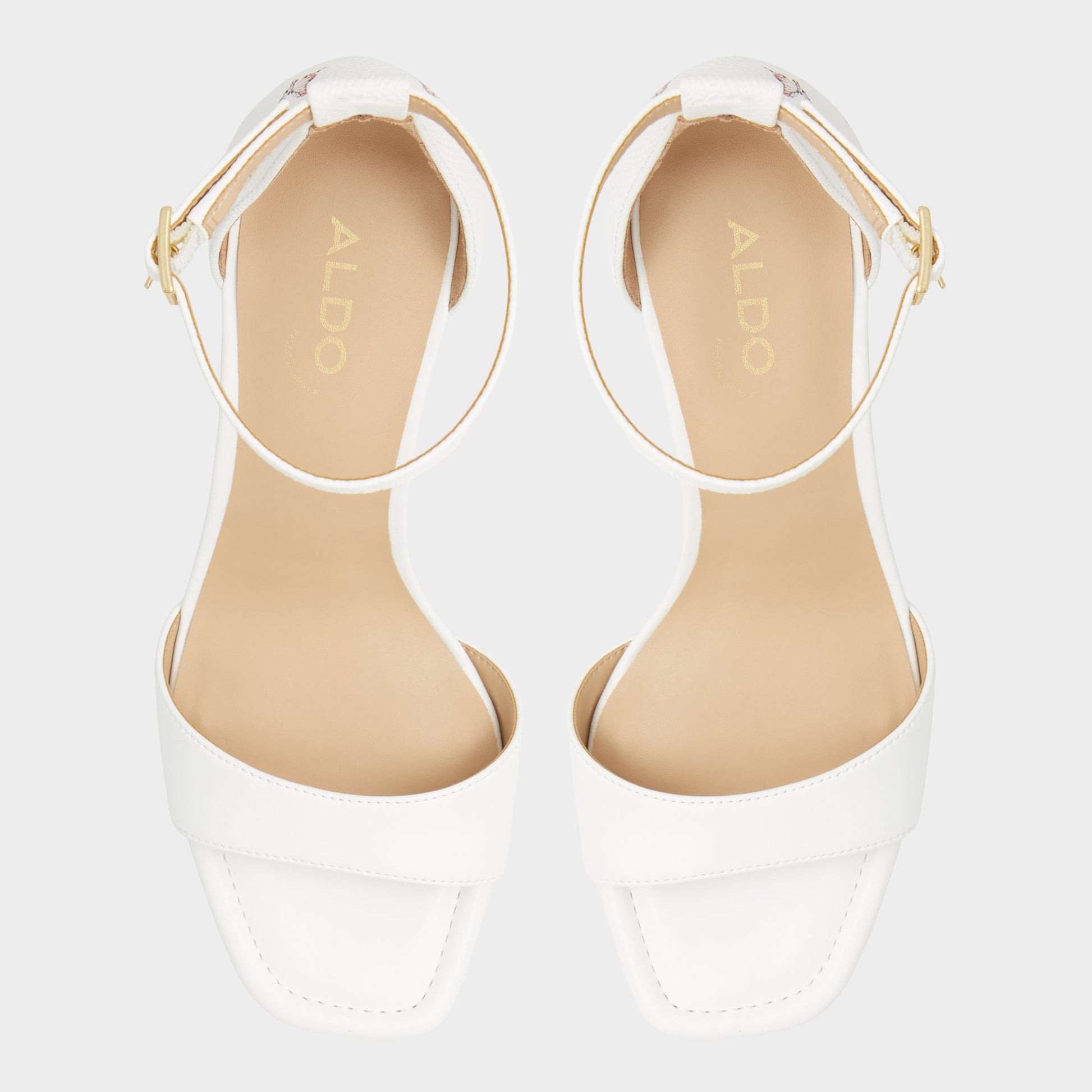 Top-down view of the White Multi Enaegyn Strappy heeled sandal
