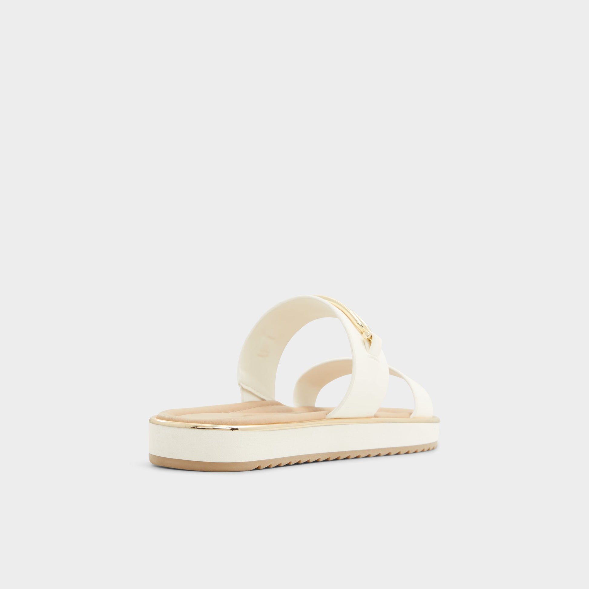 Three-quarter angle of White Lagoon Strappy flat sandal's back side