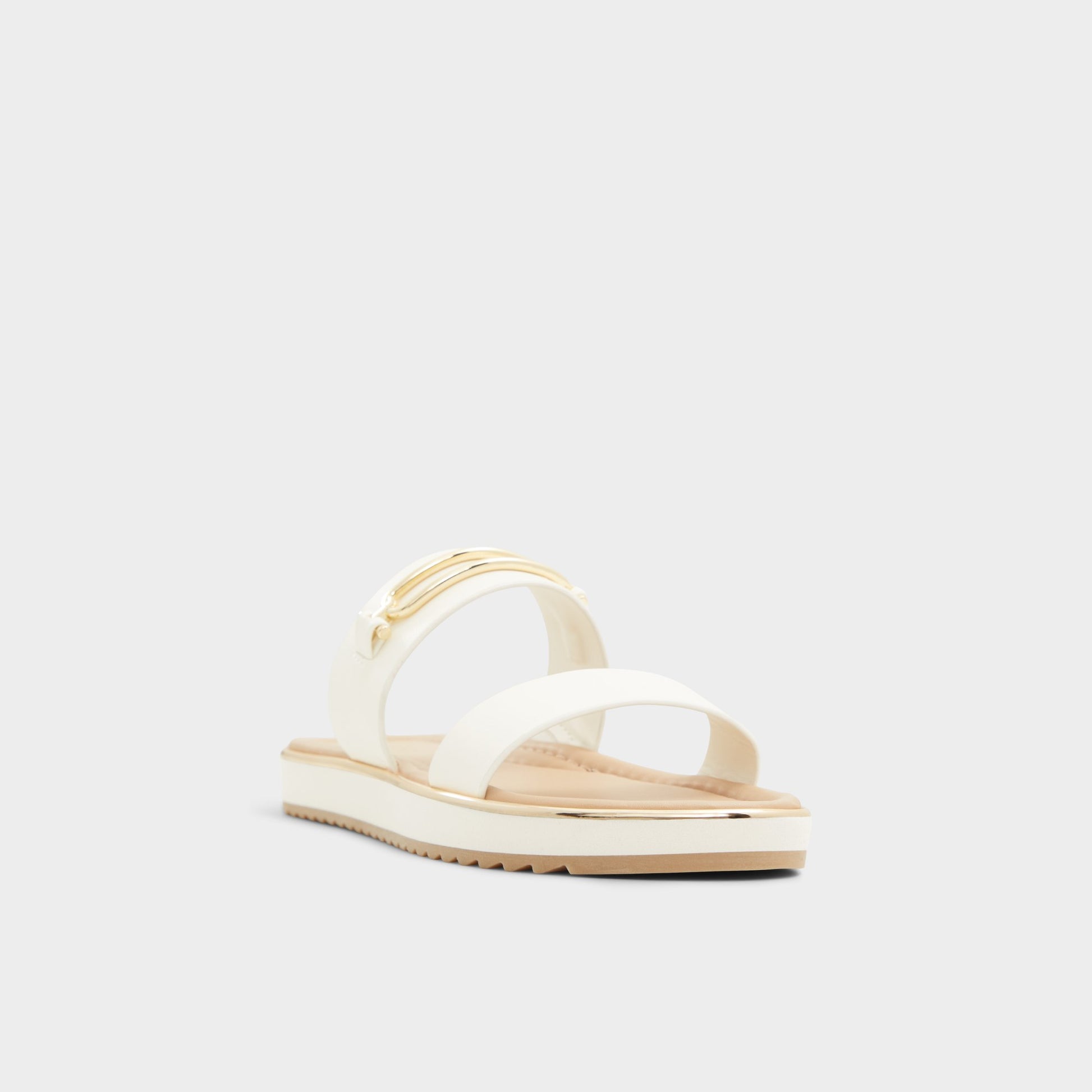 Three-quarter angle of White Lagoon Strappy flat sandal's front side