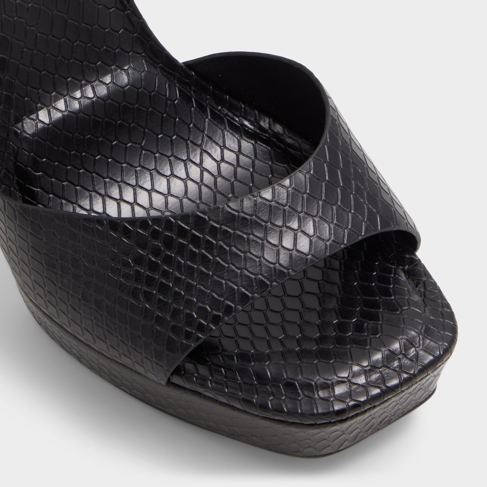Close-up of the Other Black Medusa Strappy heeled sandal