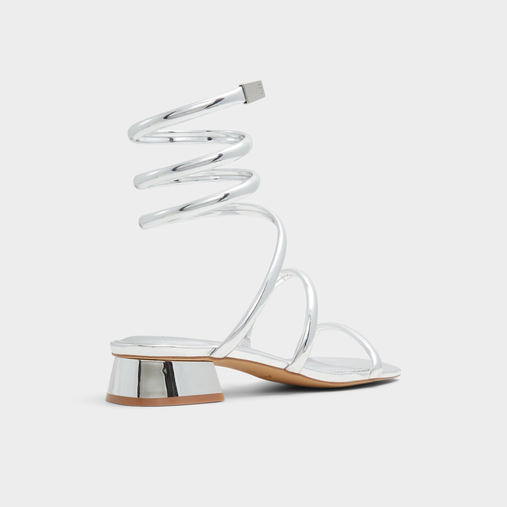 Three-quarter angle of Silver Spinna Strappy sandal's back side