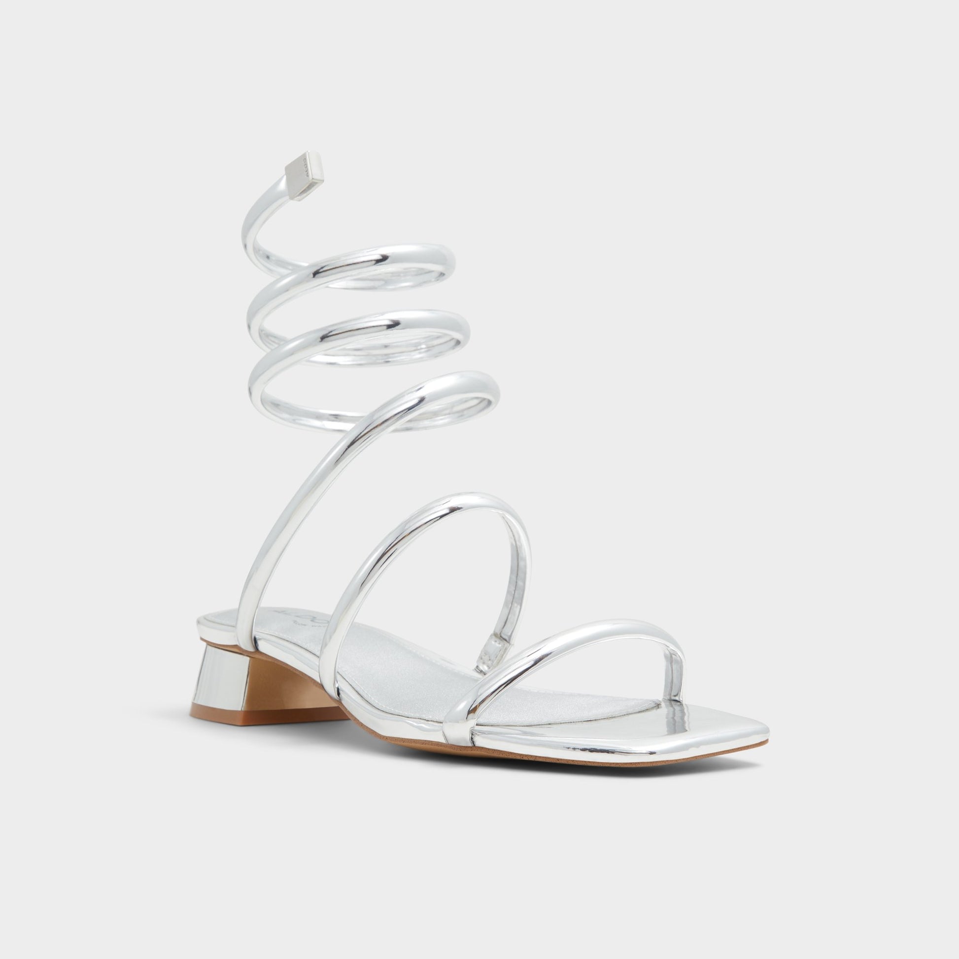 Three-quarter angle of Silver Spinna Strappy sandal's front side