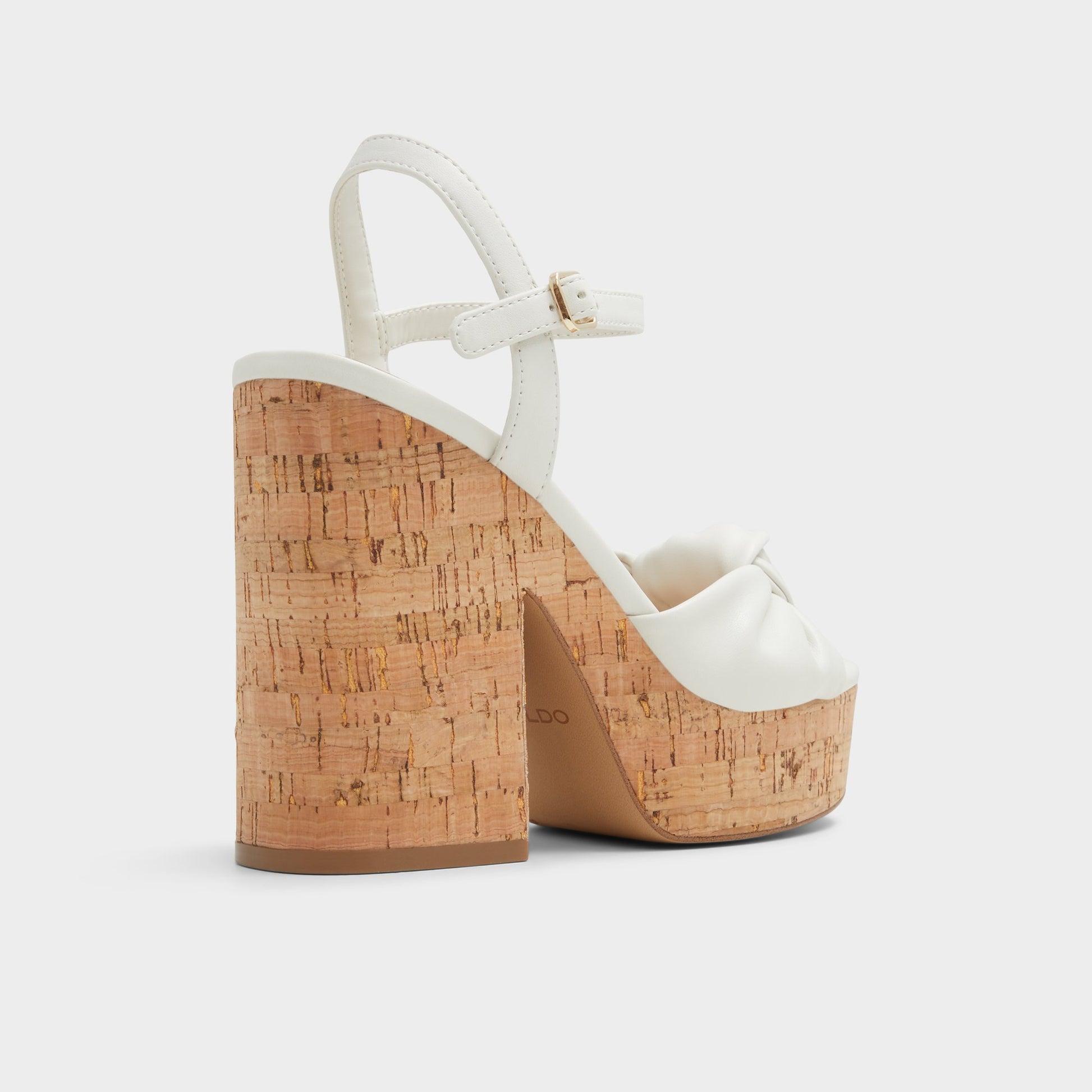 Three-quarter angle of White/Bone Ulialdan Strappy heeled sandal's back side
