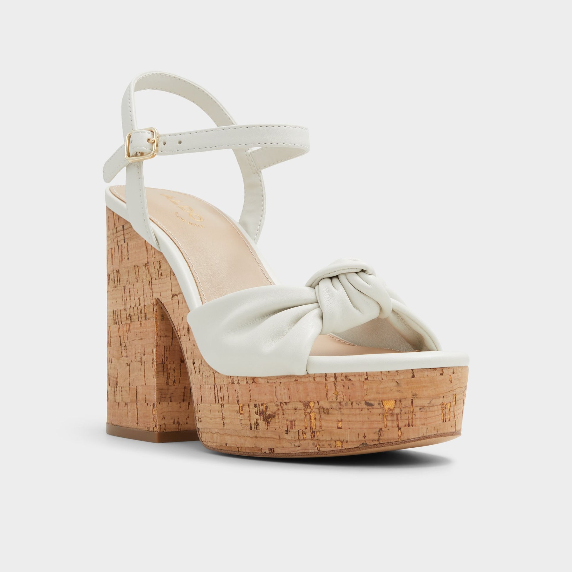 Three-quarter angle of White/Bone Ulialdan Strappy heeled sandal's front side