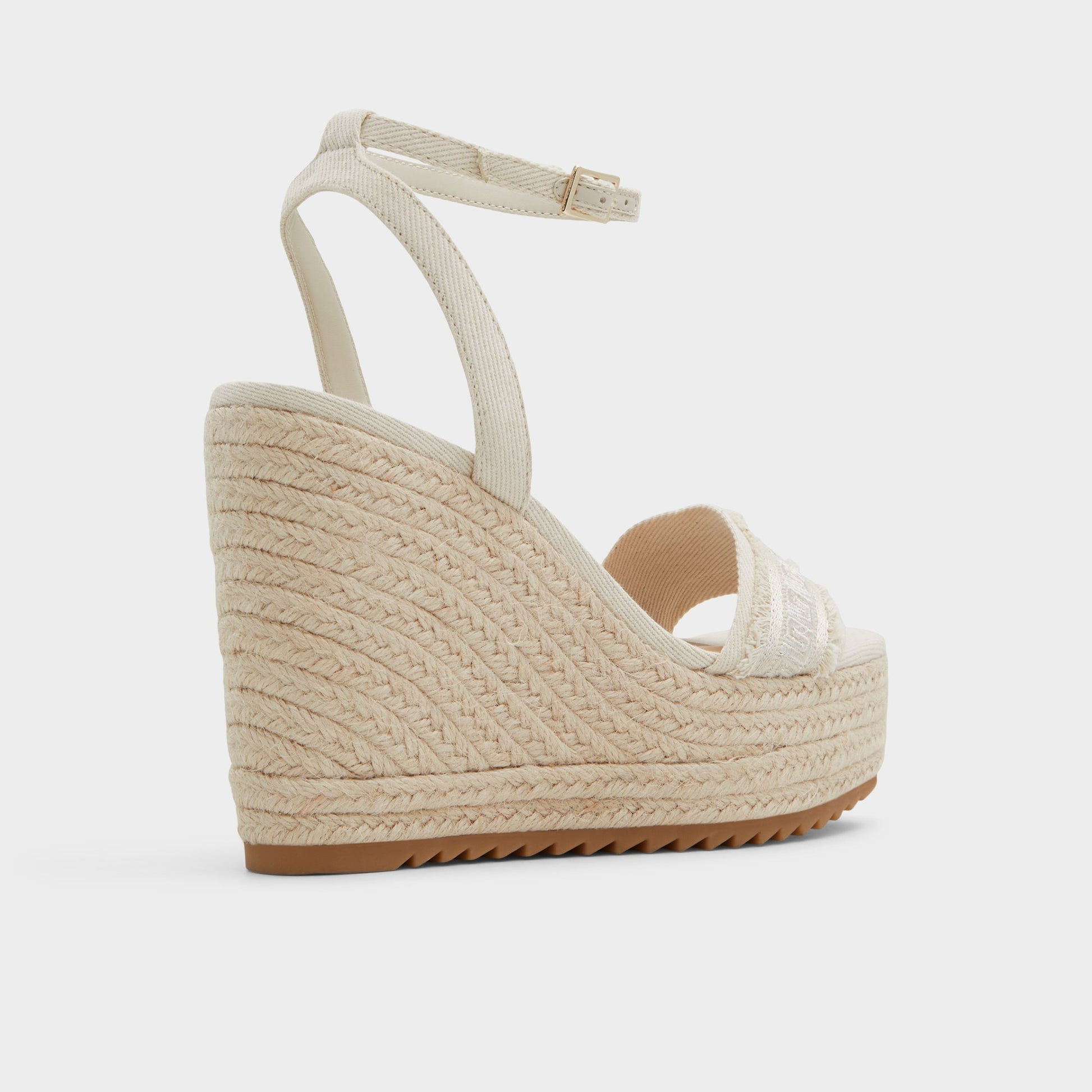 Three-quarter angle of Other white Aberitram Wedge sandal's back side