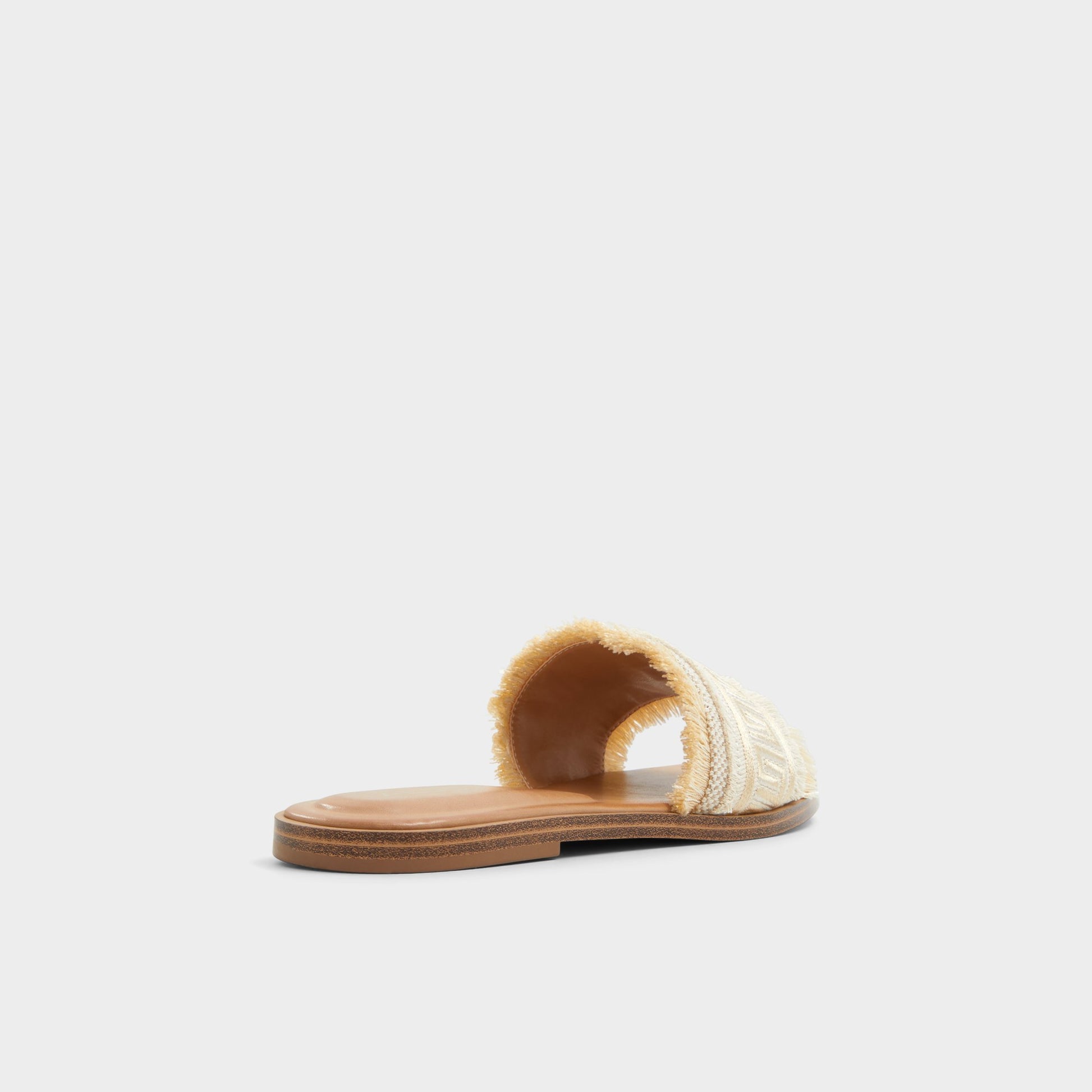 Three-quarter angle of Gold Nalani Slide sandal's back side
