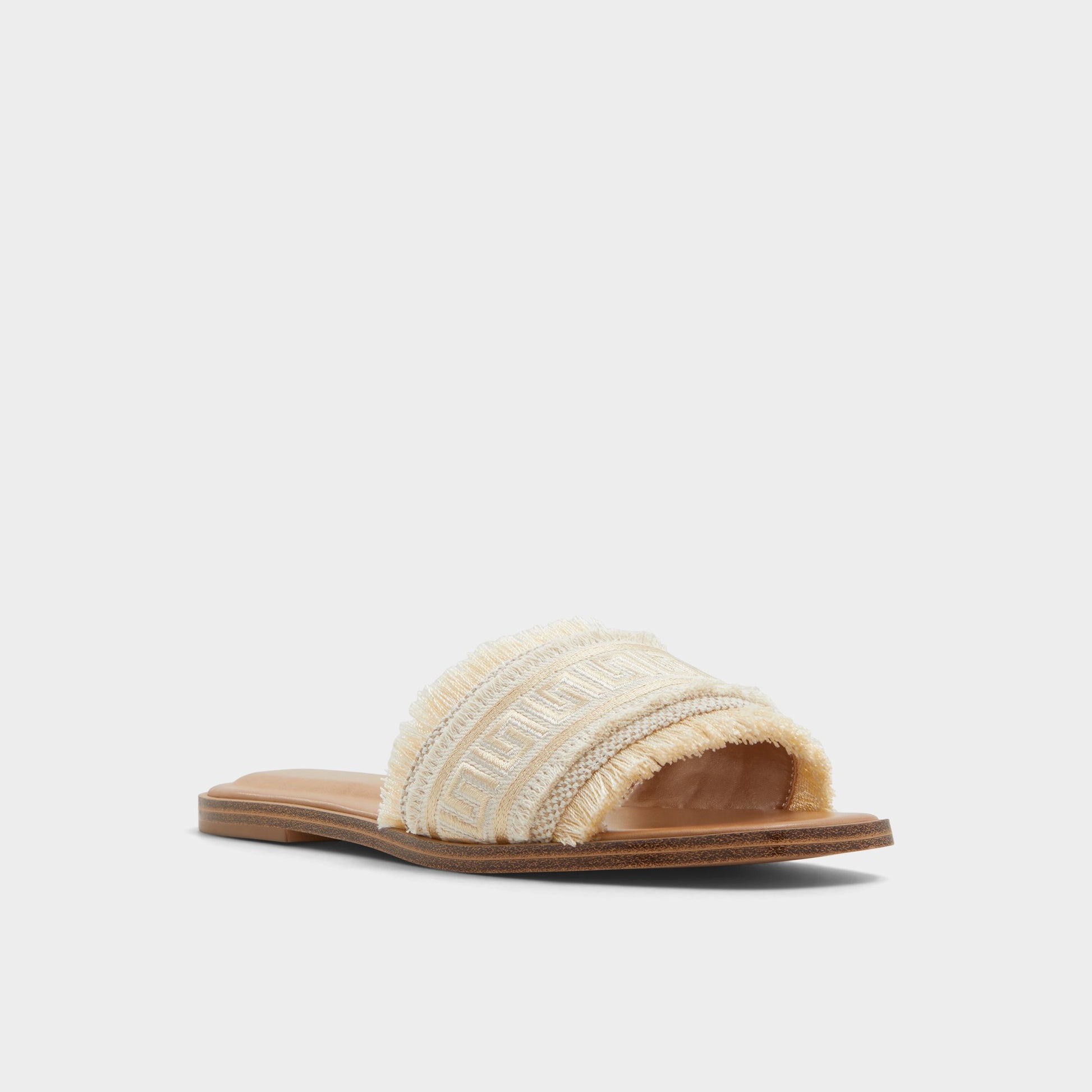 Three-quarter angle of Gold Nalani Slide sandal's front side