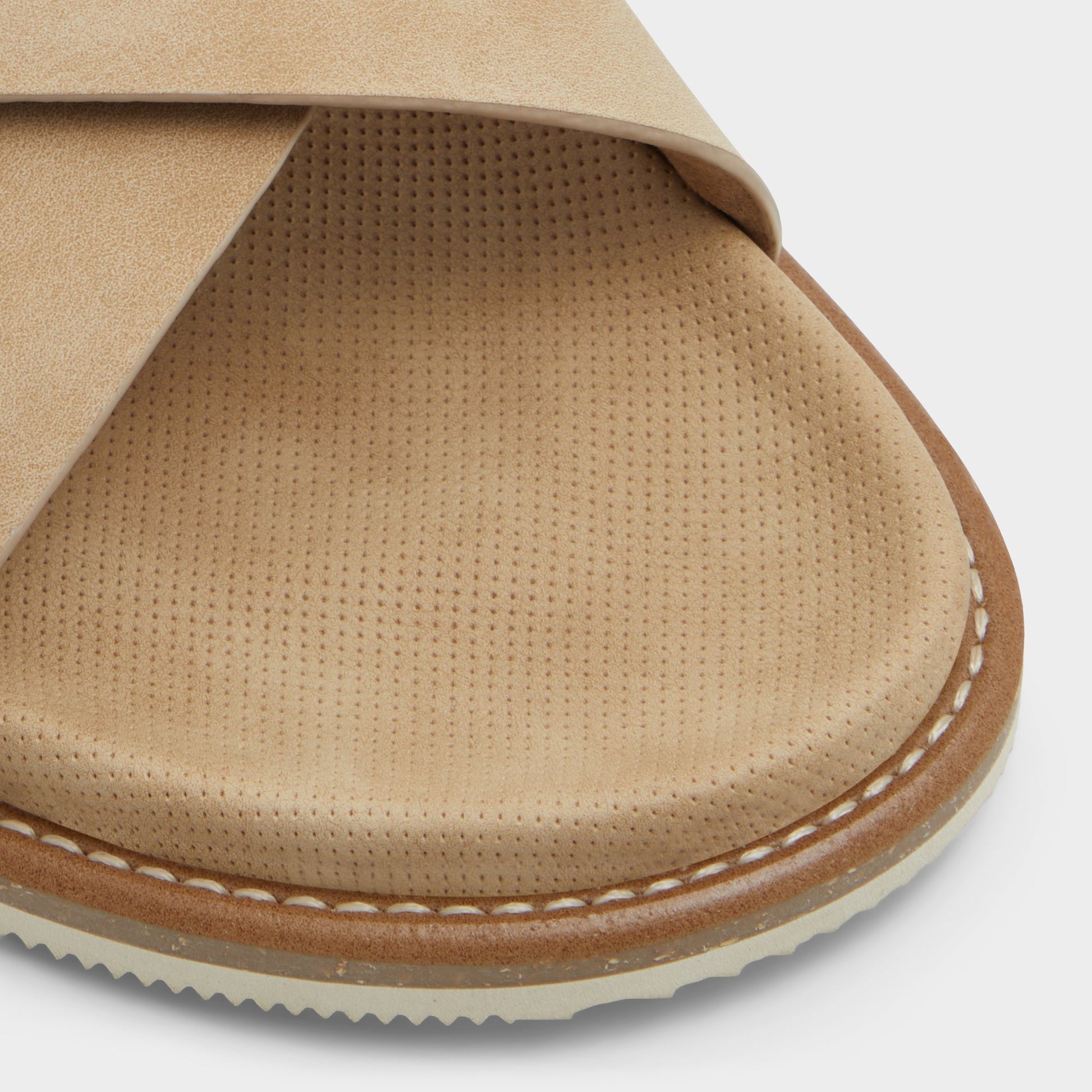 Close-up of the Beige Marrin Slide sandal