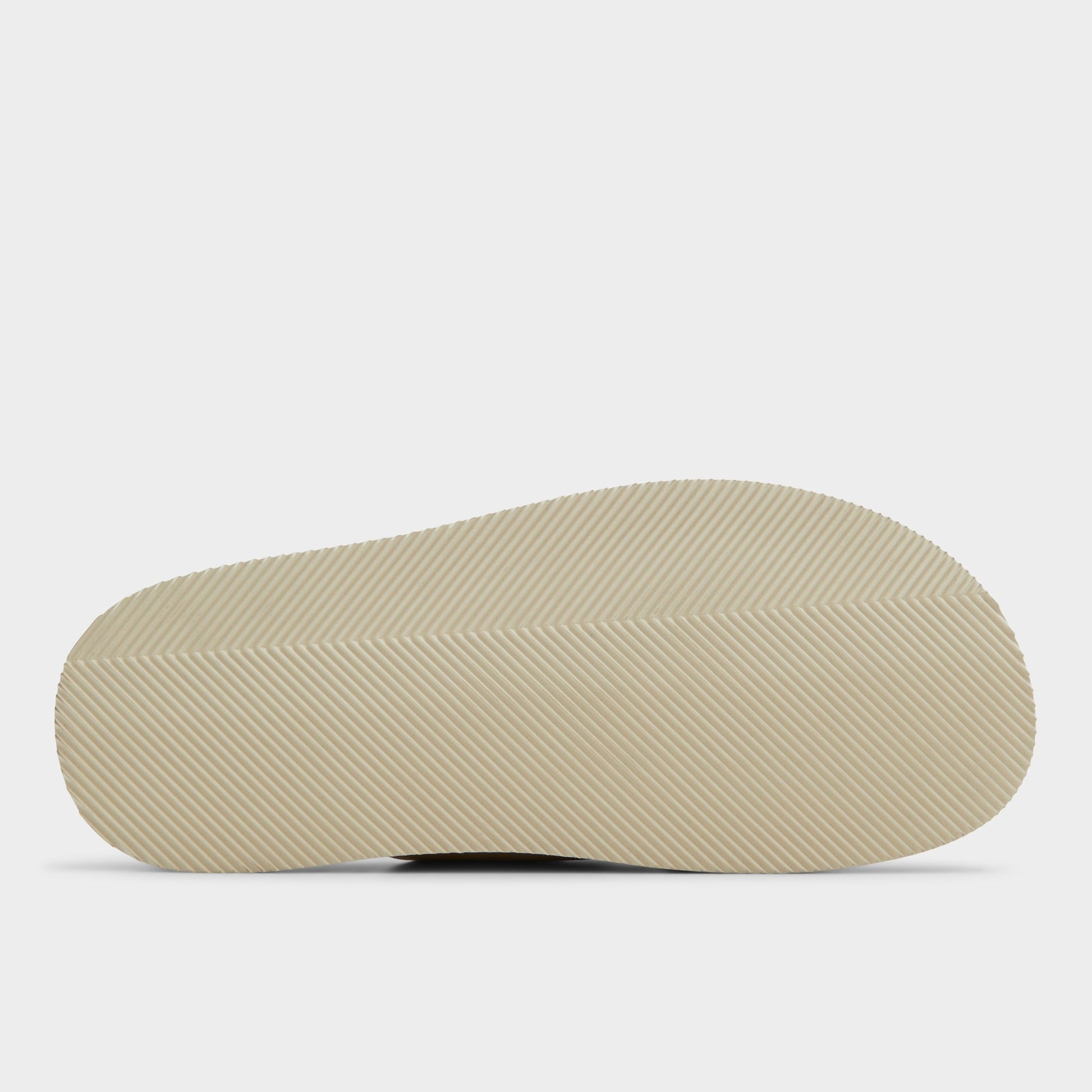 View of Beige Marrin Slide sandal's sole