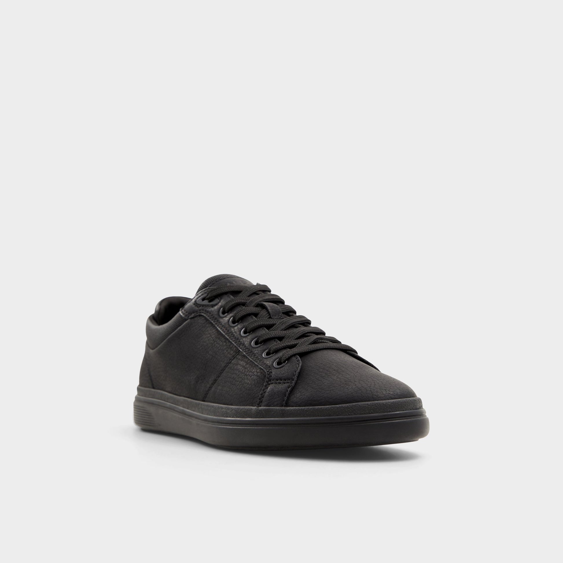 Three-quarter angle of Black/Black Finespec Low top sneaker's front side