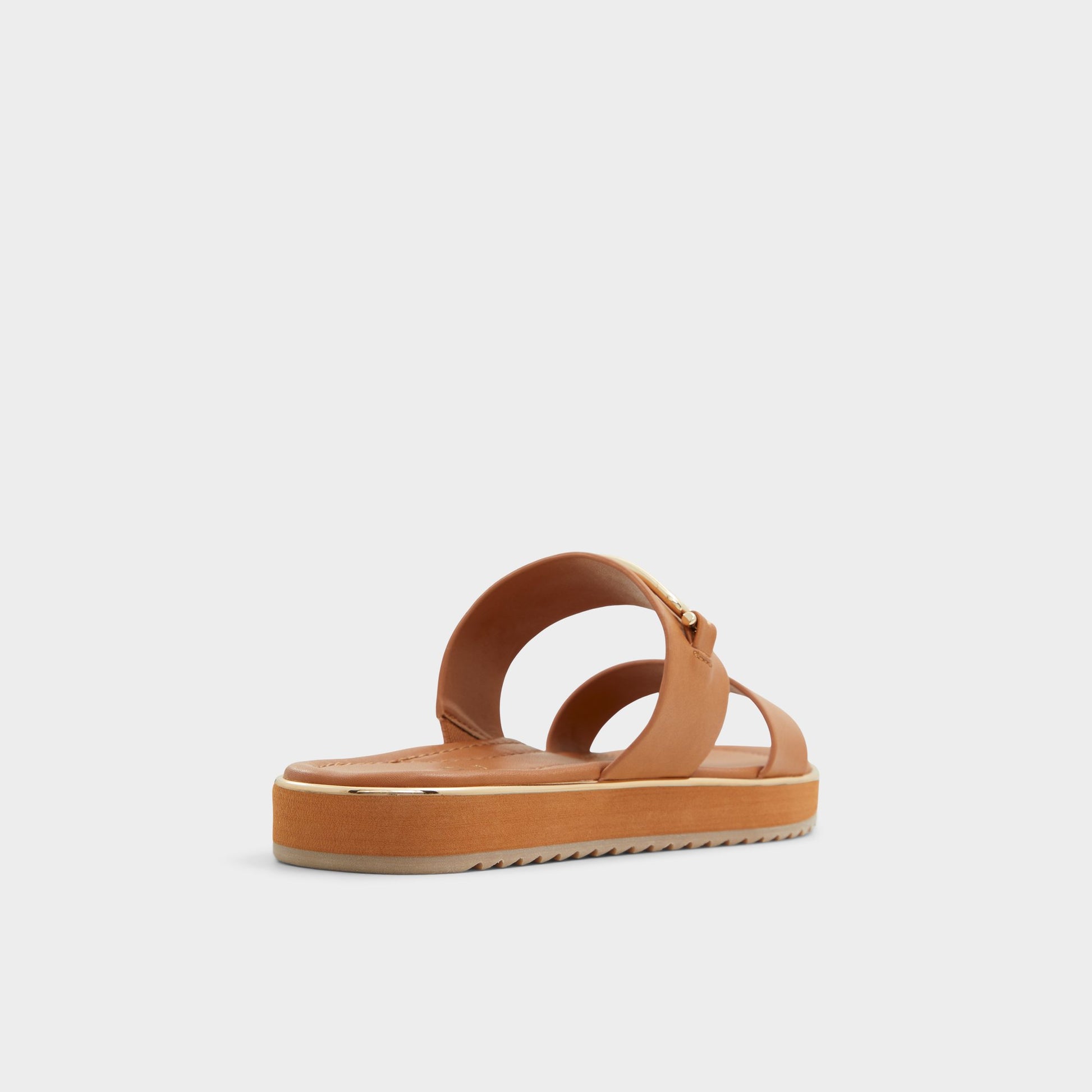 Three-quarter angle of Other Brown Lagoon Strappy flat sandal's back side