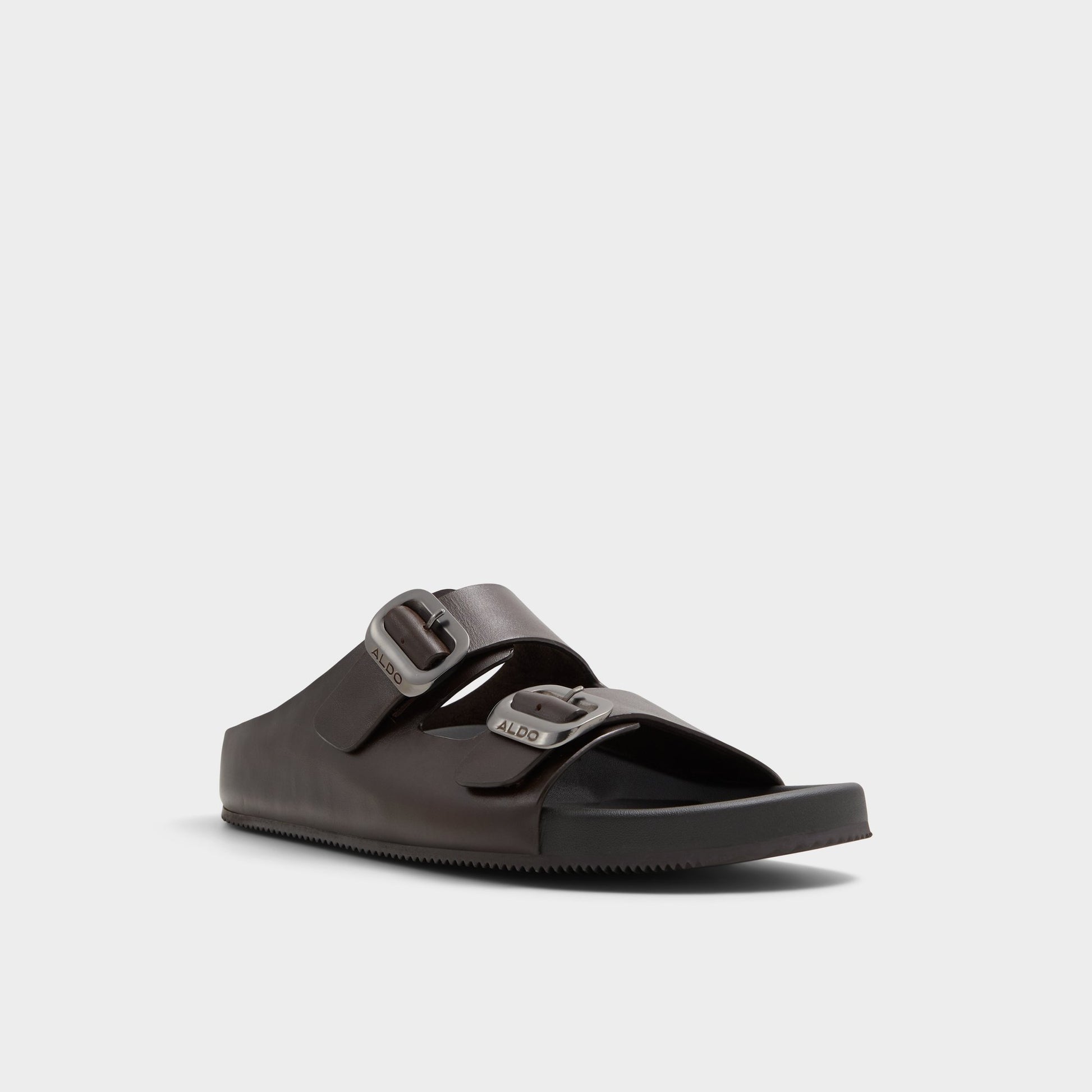 Three-quarter angle of Dark Brown Kennebunk Slide sandal's front side