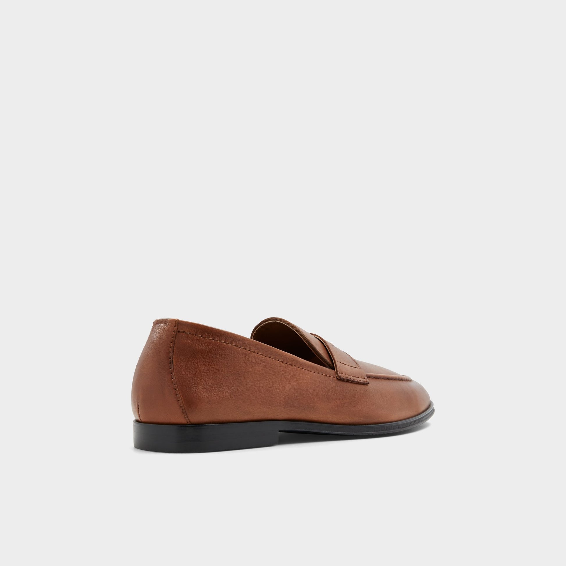 Three-quarter angle of Cognac Journey Loafer's back side