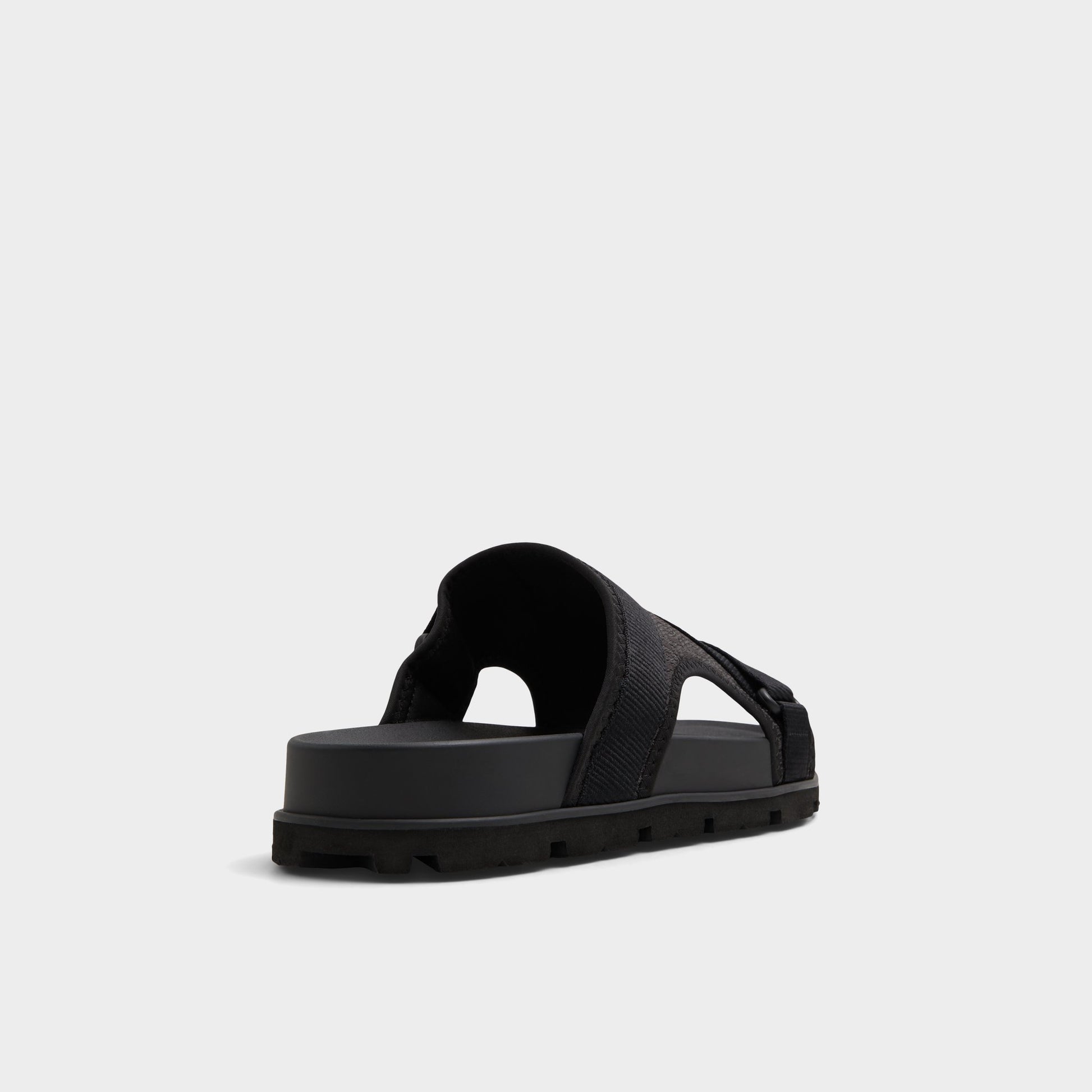 Three-quarter angle of Open Black Deniels Slide sandal's back side