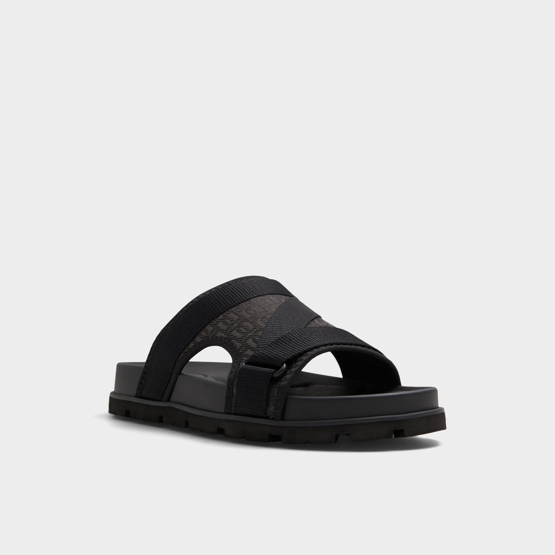 Three-quarter angle of Open Black Deniels Slide sandal's front side