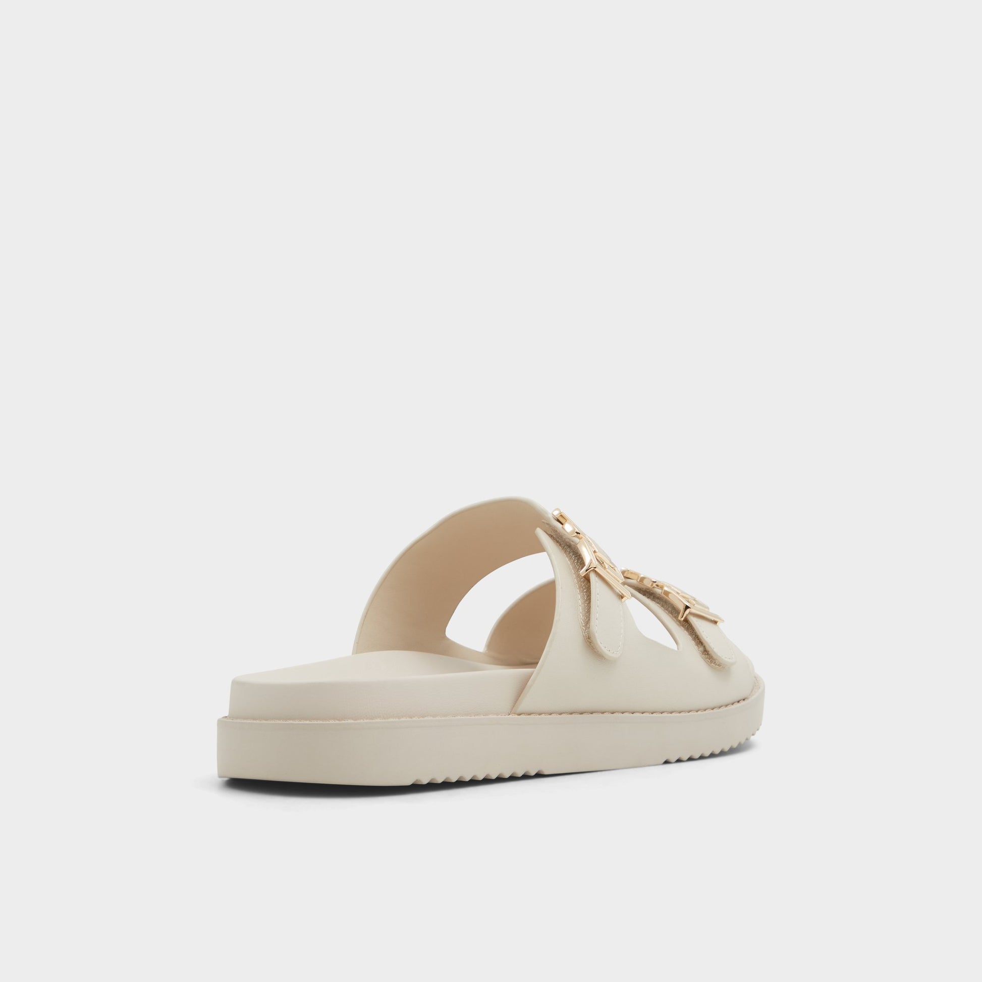 Three-quarter angle of Other white Alessie Footbed sandal's back side
