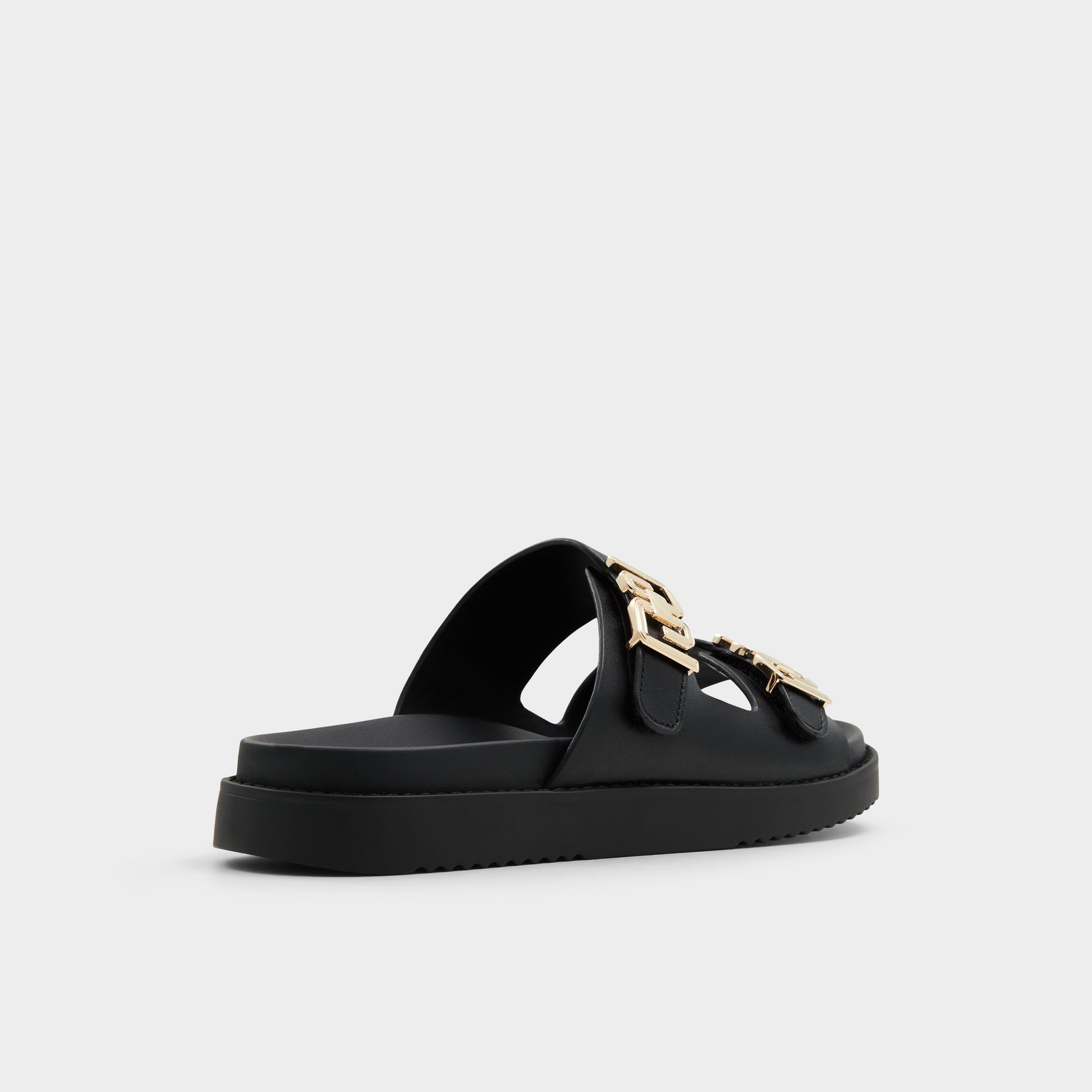 Three-quarter angle of Black Alessie Footbed sandal's back side