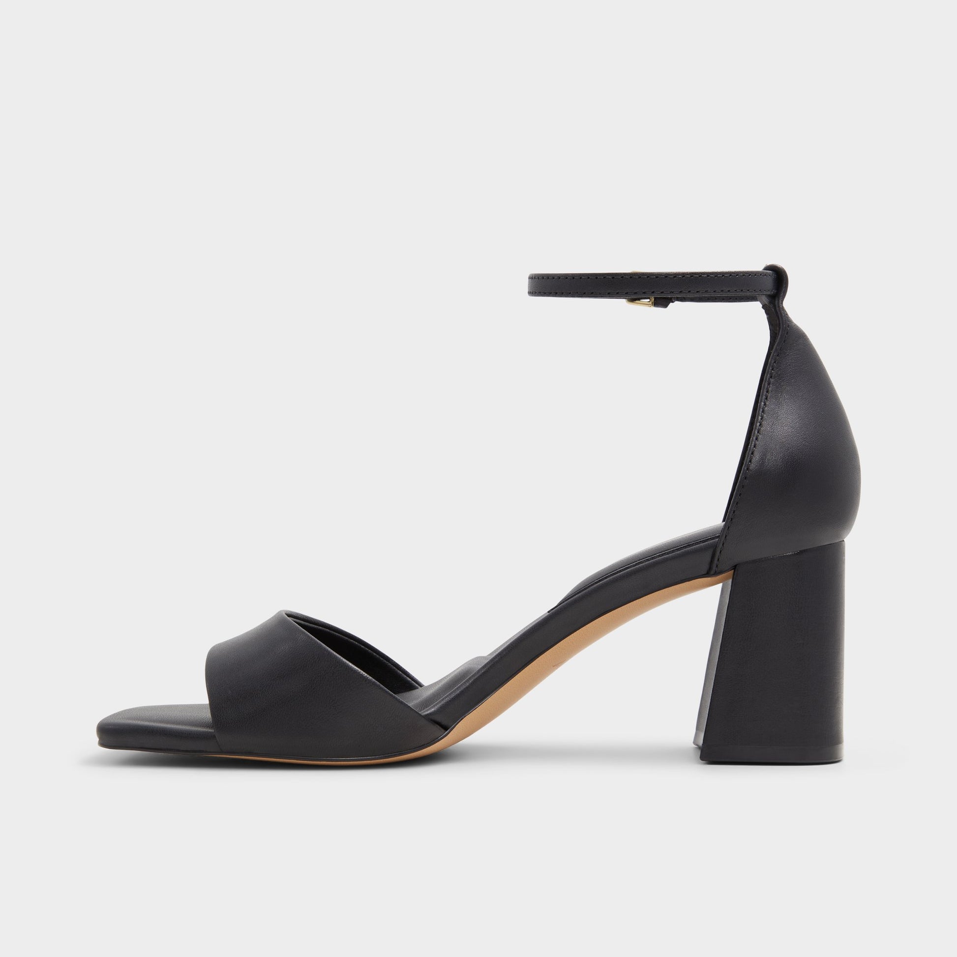 Side view of Black Maize Black heeled sandal