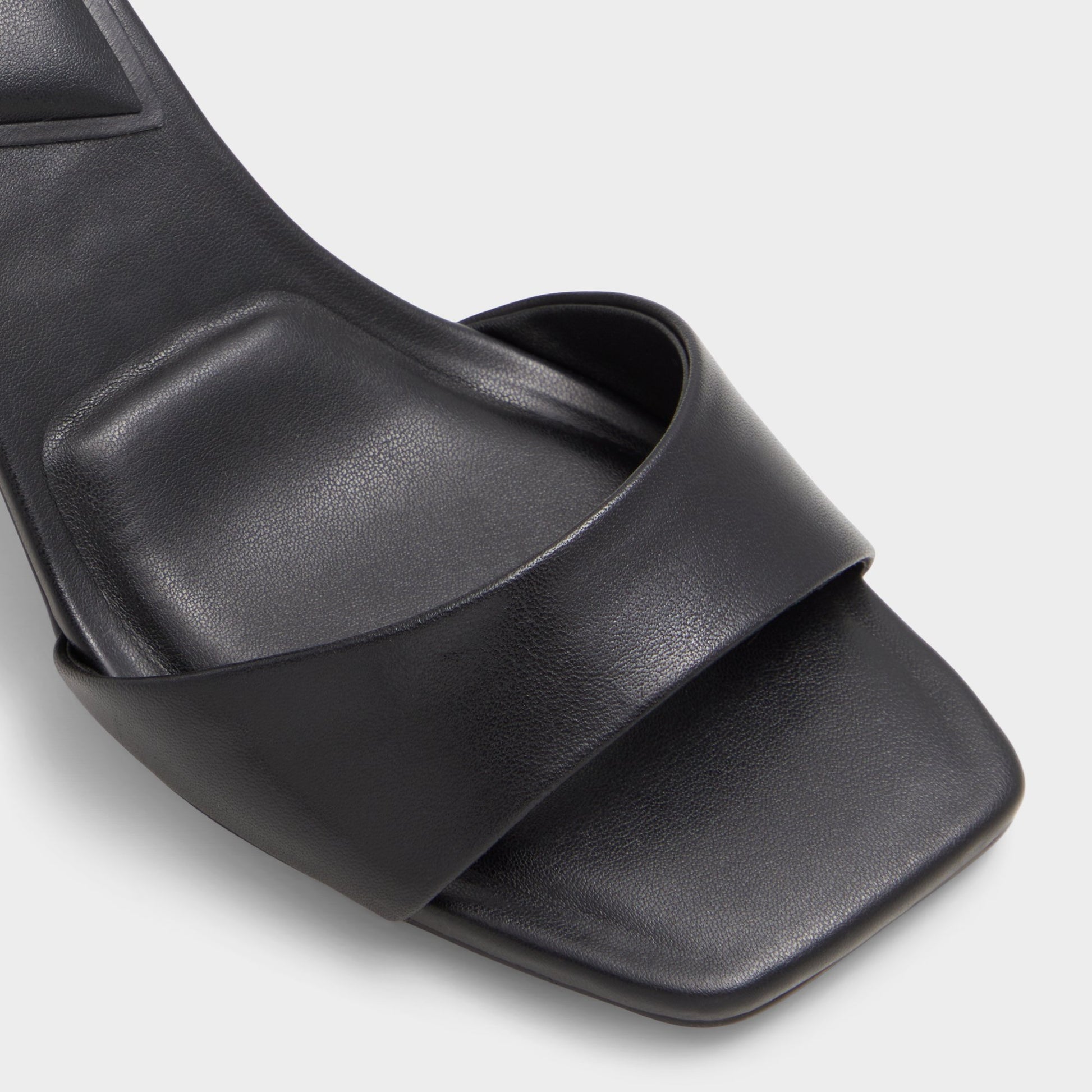 Close-up of the Black Maize Black heeled sandal
