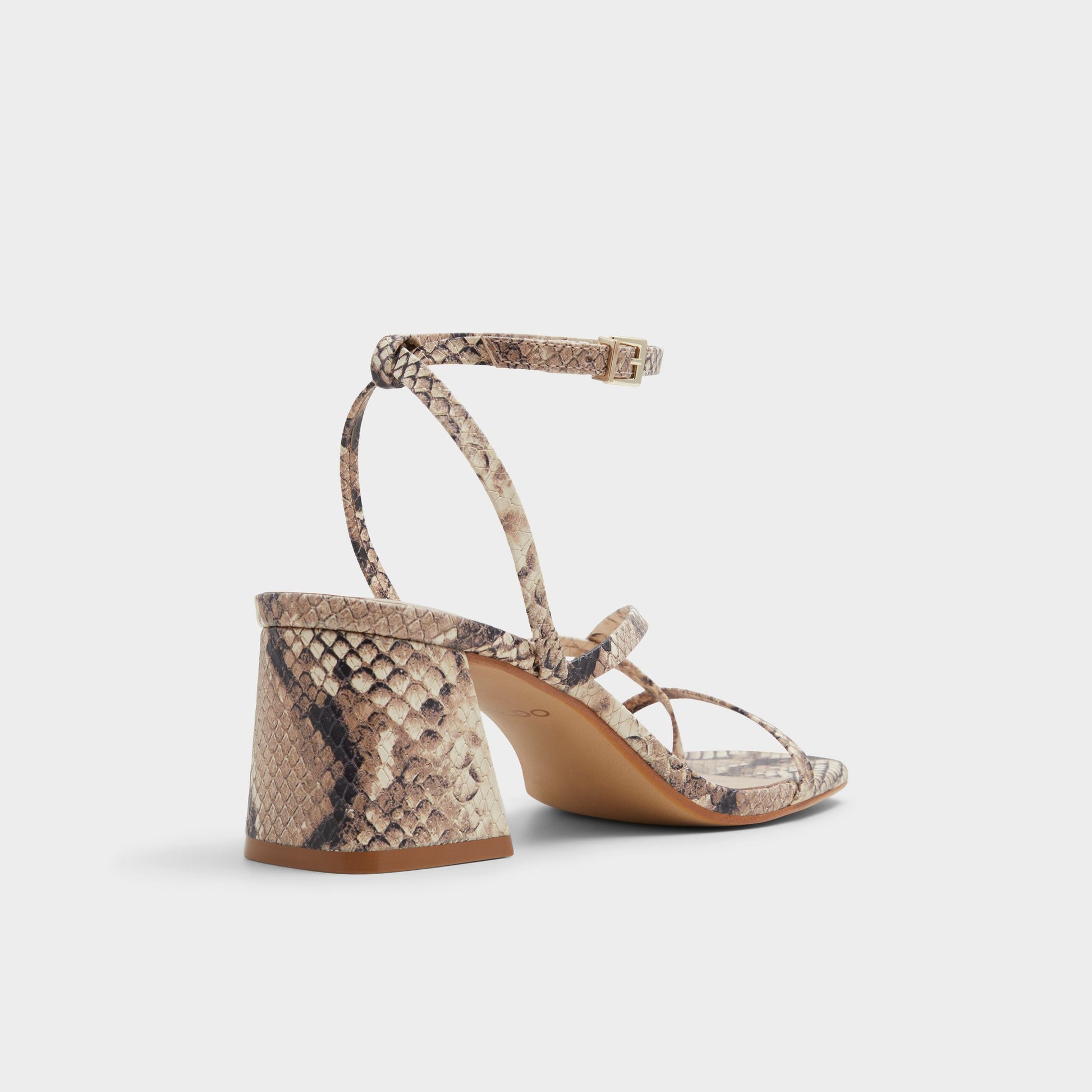 Three-quarter angle of Brown Overflow Adrauder Strappy block heeled sandal's back side