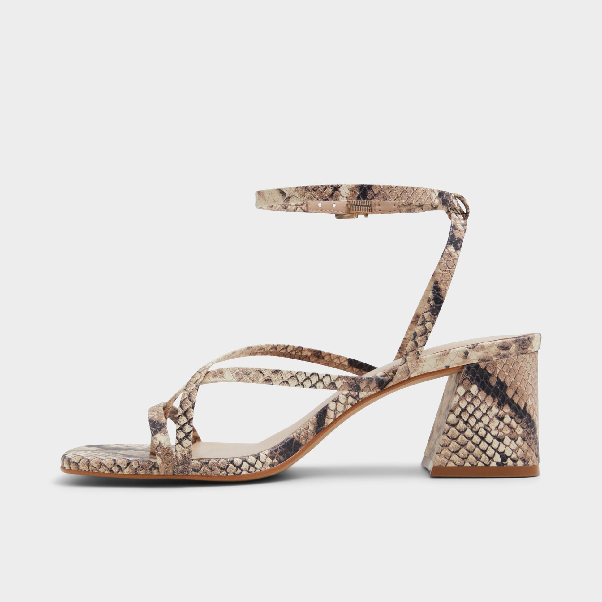 Side view of Brown Overflow Adrauder Strappy block heeled sandal